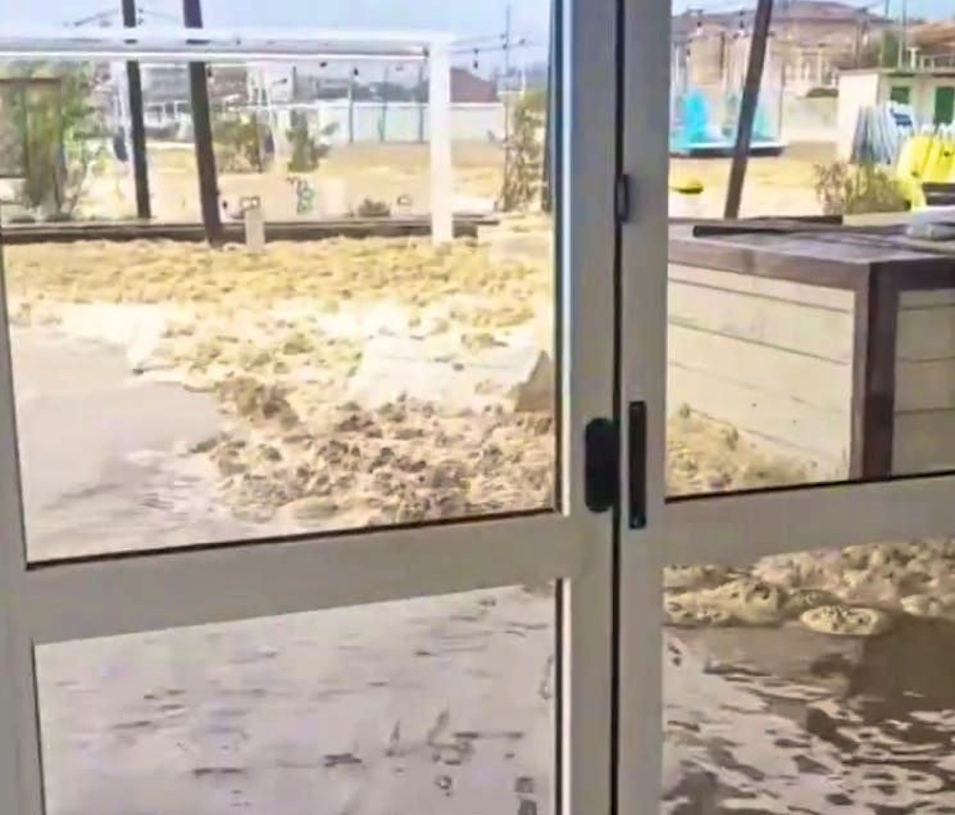 Mini tsunami hits Italy's Adriatic coast - vacation resorts are under water