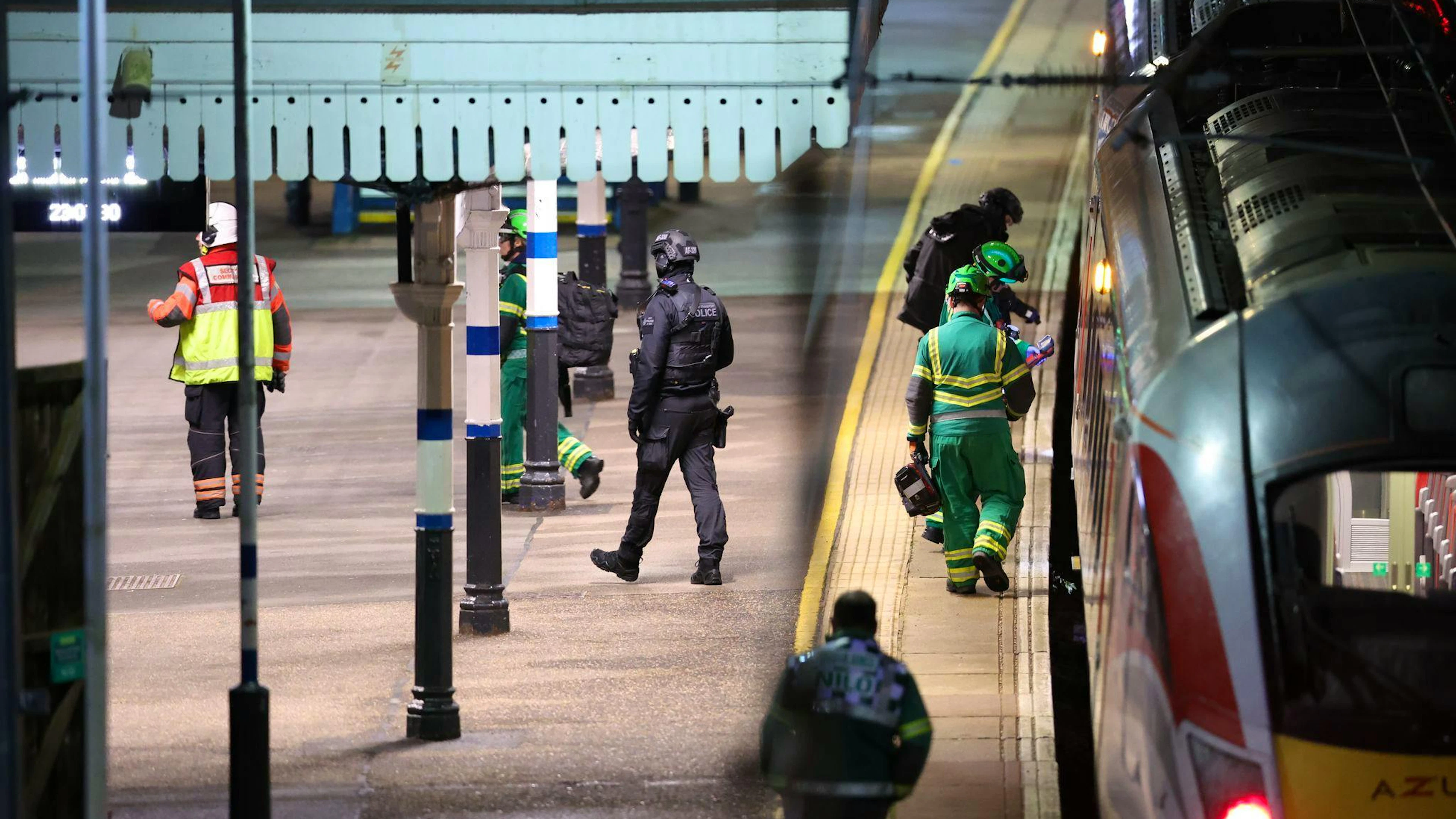 Rettungskräfte arbeiten auf dem Bahnsteig des Bahnhofs Huntingdon in England, nachdem mehrere Personen niedergestochen worden waren.