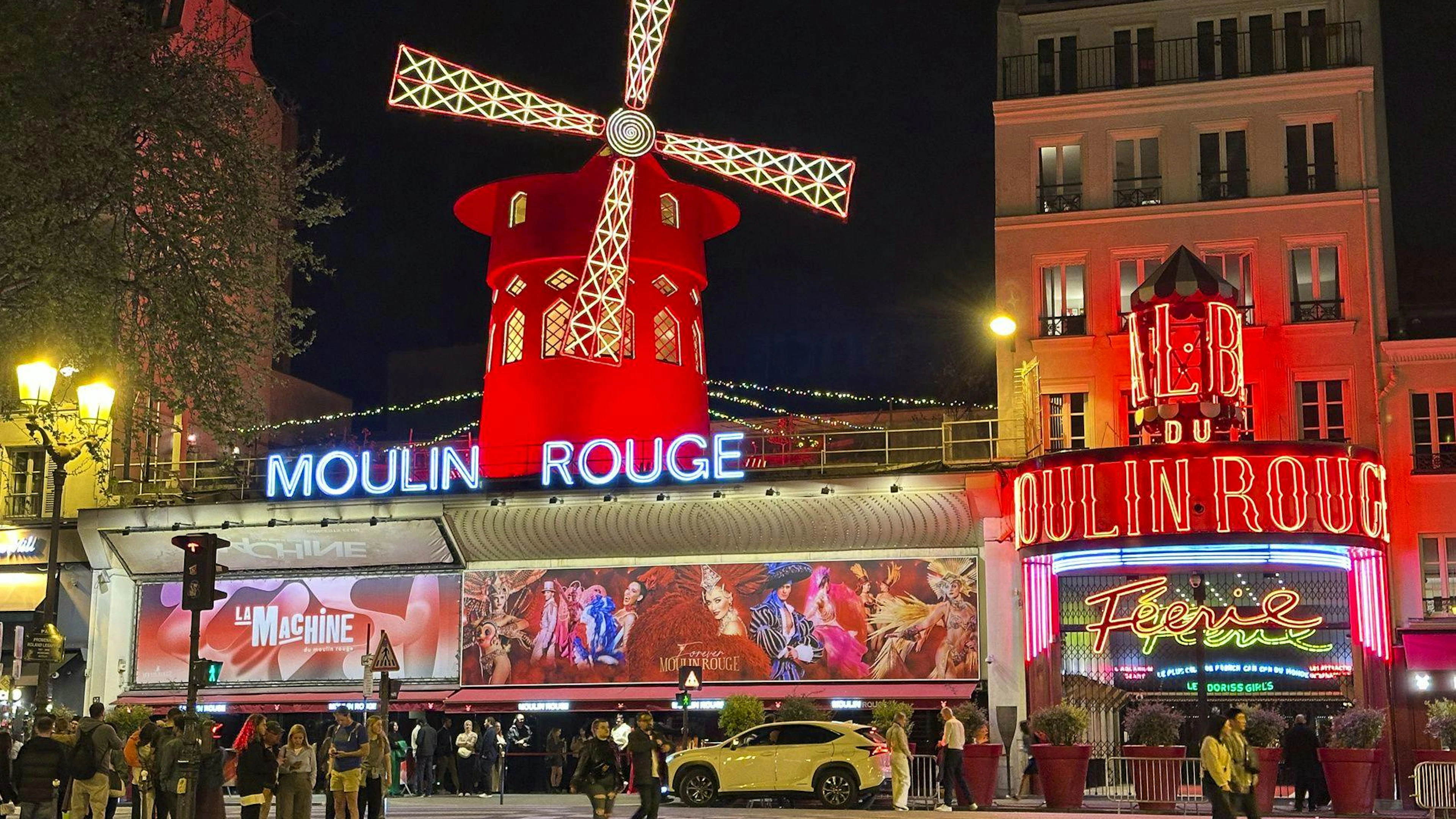 The Moulin Rouge cabaret is seen on April 12, 2024, in the Montmartre section of Paris, France. (AP Photo/Robert F. Bukaty)