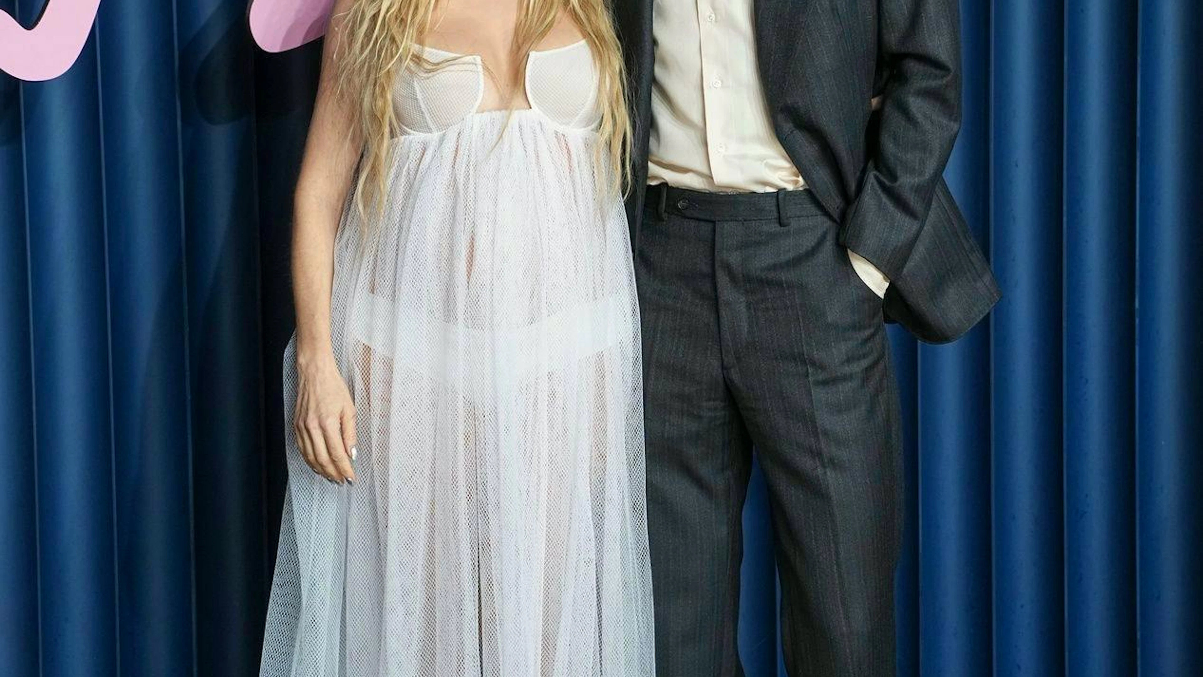Sienna Miller e il compagno Oli Green.