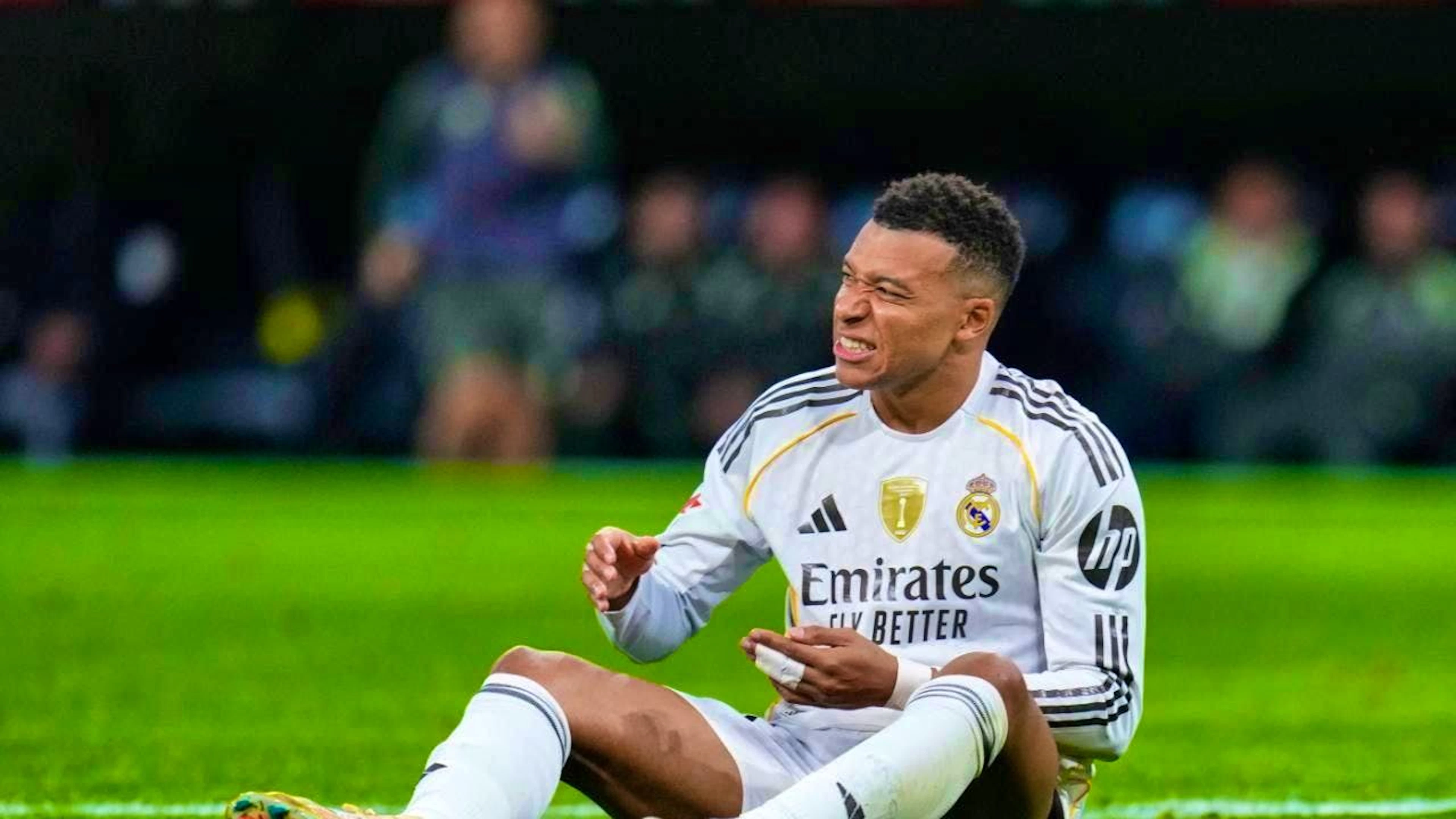 Real Madrid see red twice and lose