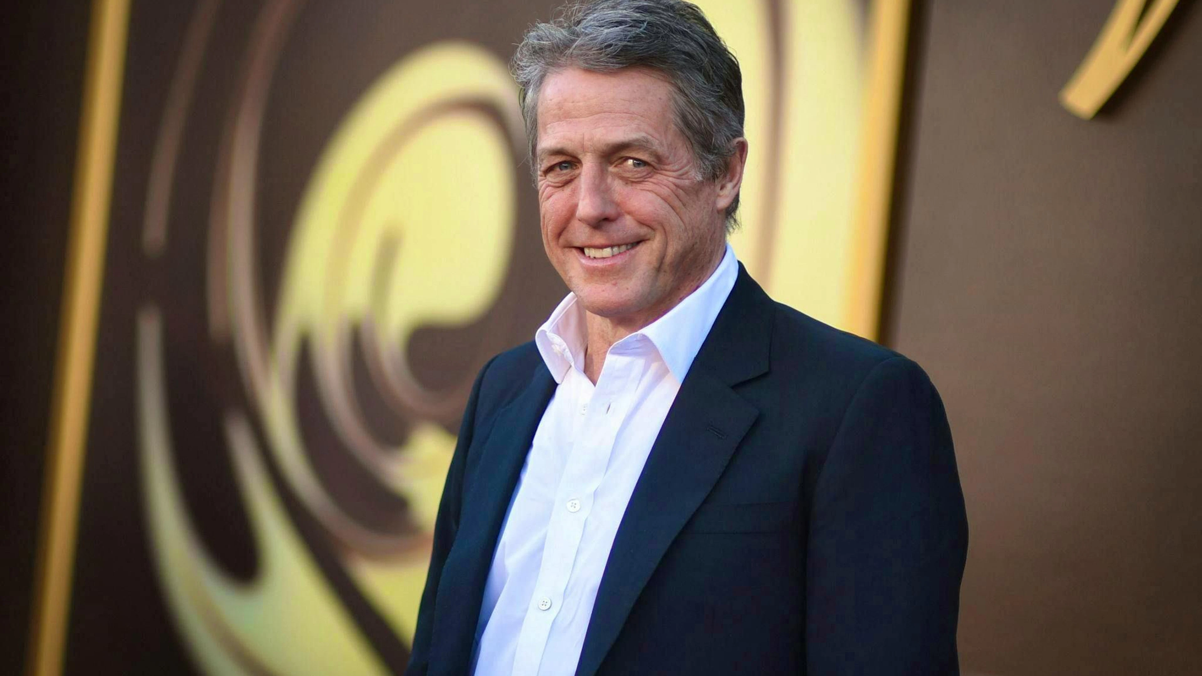 Hugh Grant talks about his faith and stress in an interview, as well as a mysterious encounter in a castle.