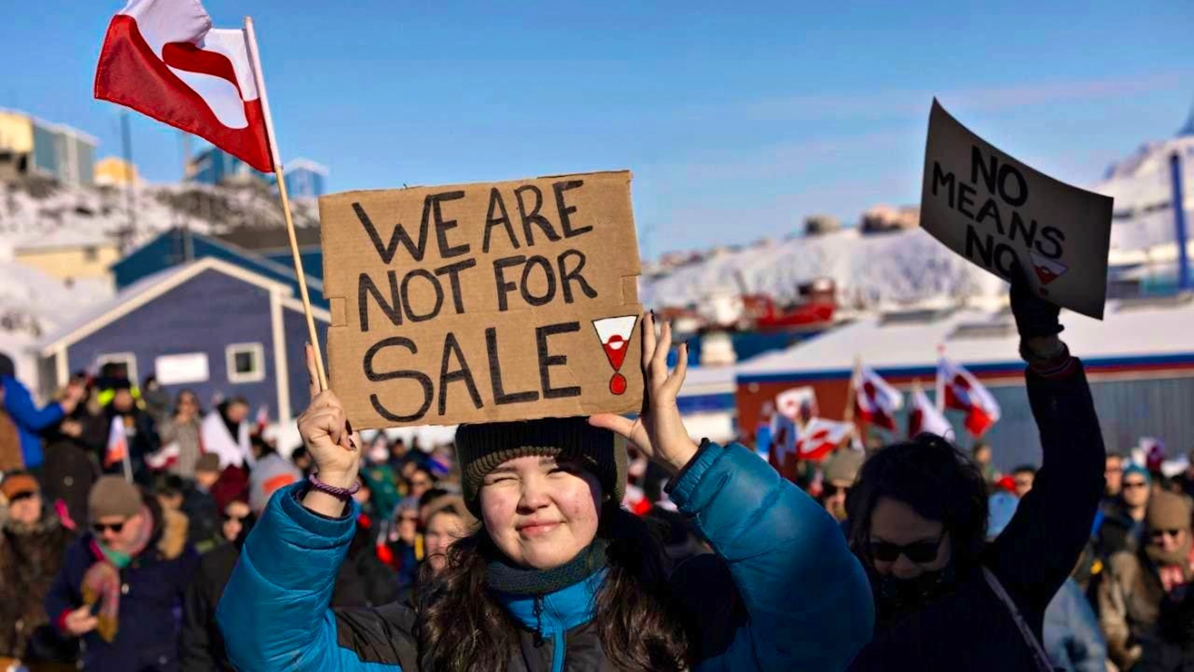 People take part in a march that ends in front of the US consulate under the slogan "Greenland belongs to the Greenlandic people". A poster reads "We are not for sale!"...People in Greenland protested months ago against US plans for the island. Photo: Christian Klindt Soelbeck/Ritzau Scanpix Foto/AP/dpa - ATTENTION: For editorial use only and only with full attribution of the above credit