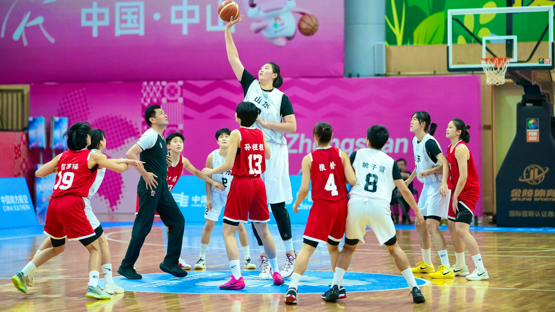 The 18-year-old basketball sensation Zhang Ziyu takes off