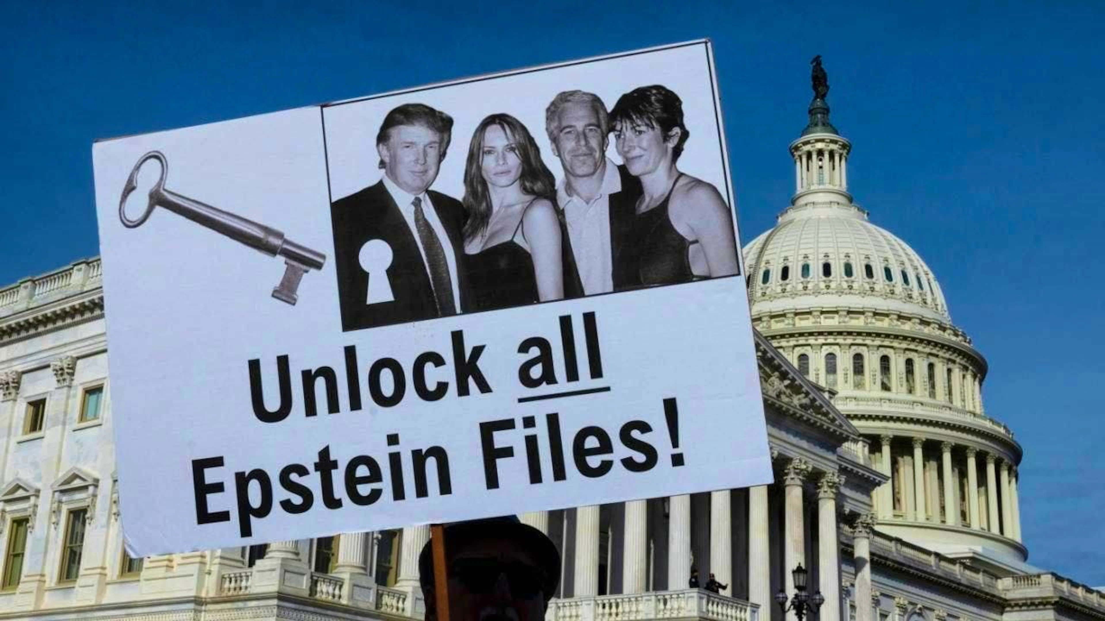 ARCHIVE - Protesters hold signs during a press conference on the Epstein Files Transparency Act in front of the U.S. Capitol in Washington, D.C. Photo: Mehmet Eser/ZUMA Press Wire/dpa
