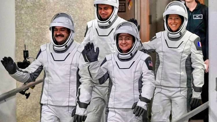 Four astronauts arrive at ISS with