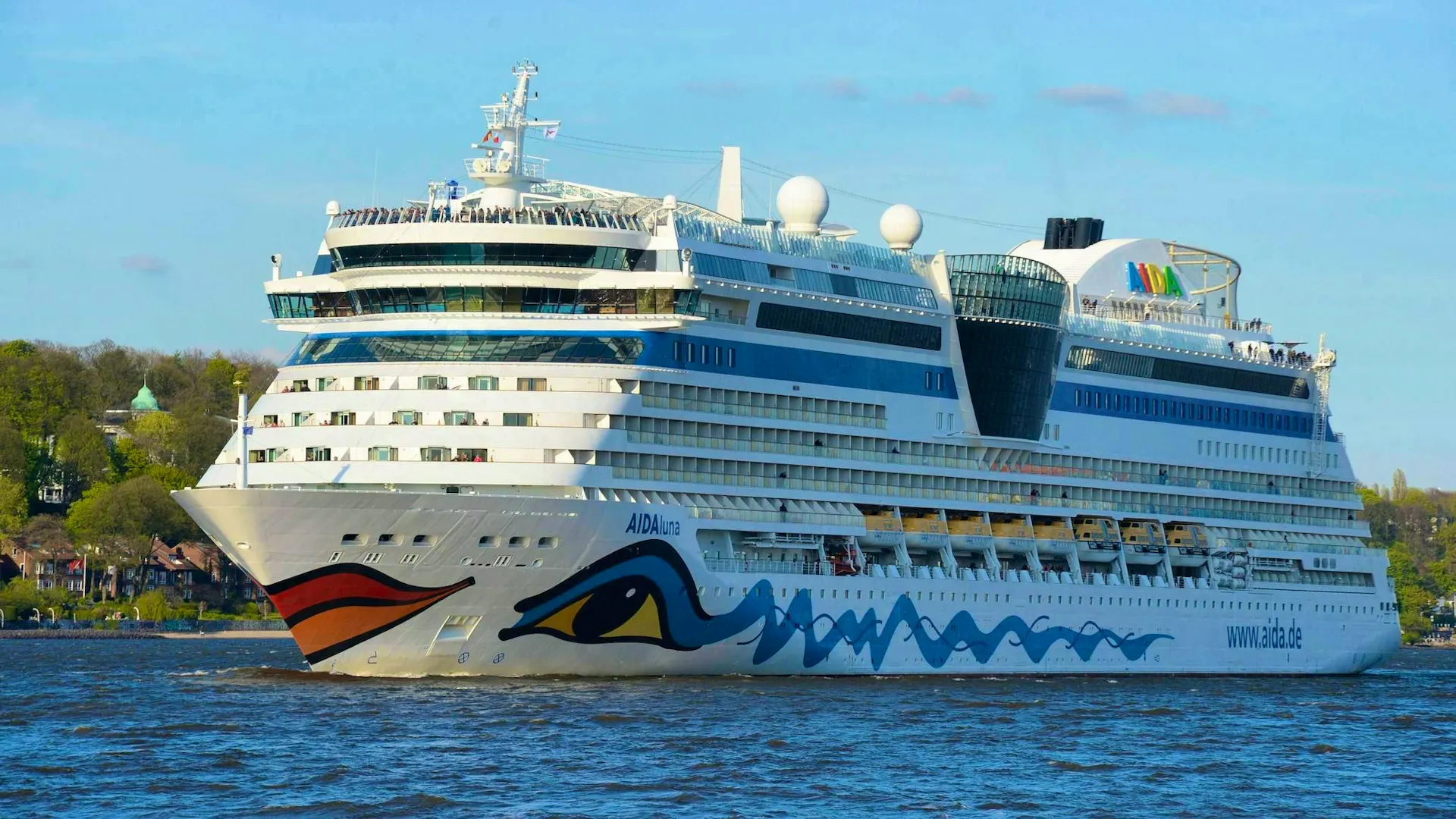 Cruise Ship Must Rescue People from a Burning Boat on the High Seas