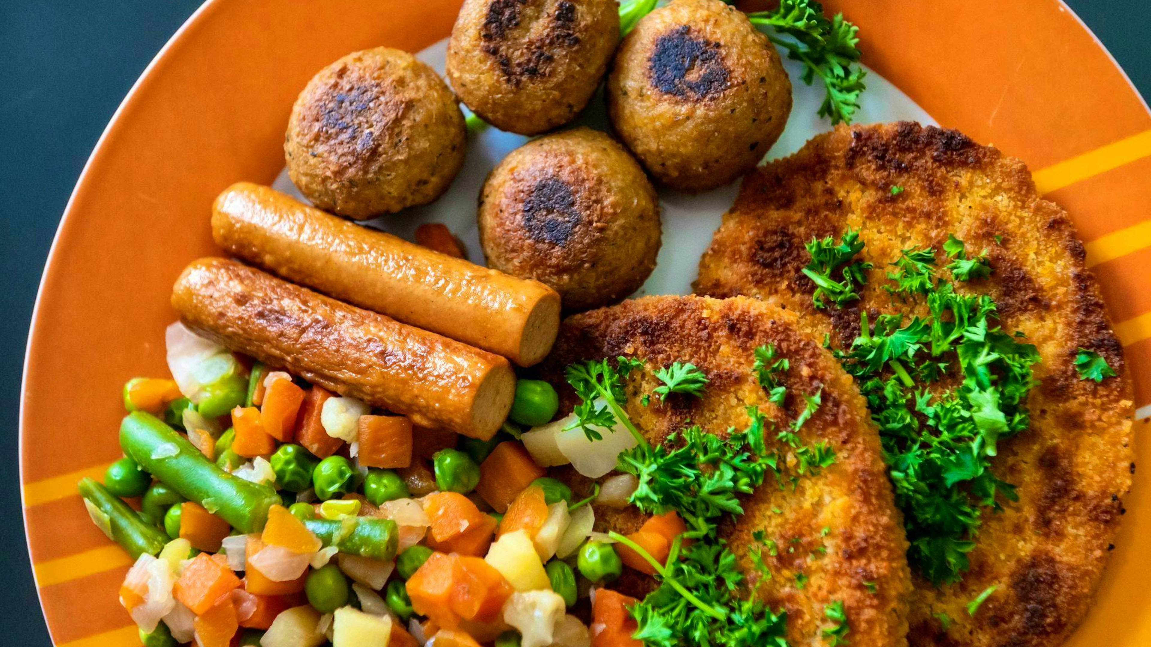 Tofu sausage" is also permitted, but "vegan bacon" is not.