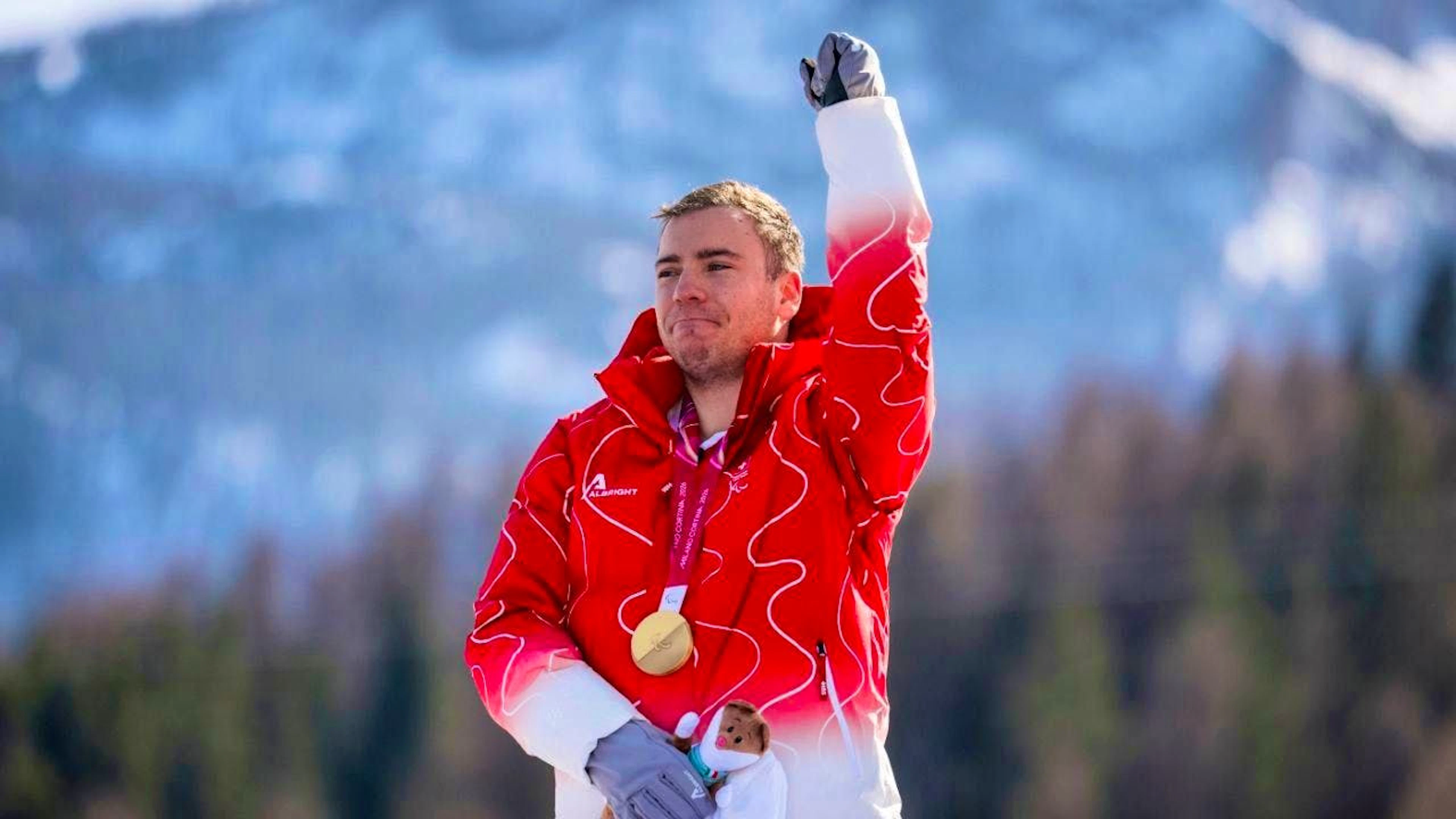 Robin Cuche wins gold in the downhill.