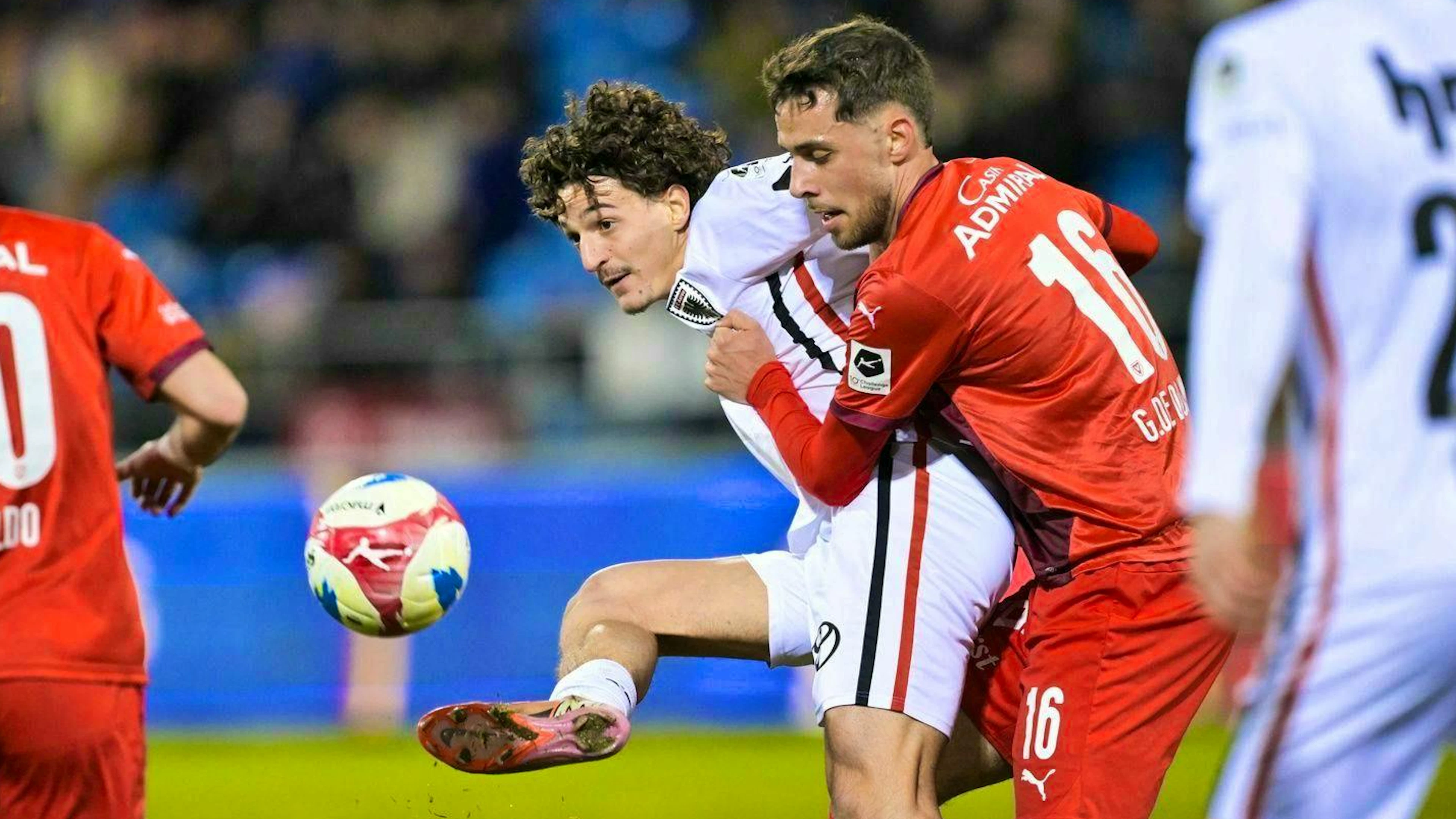 Gabriele De Donno of FC Vaduz (right) gives Aarau's Leon Frokaj no room to breathe.