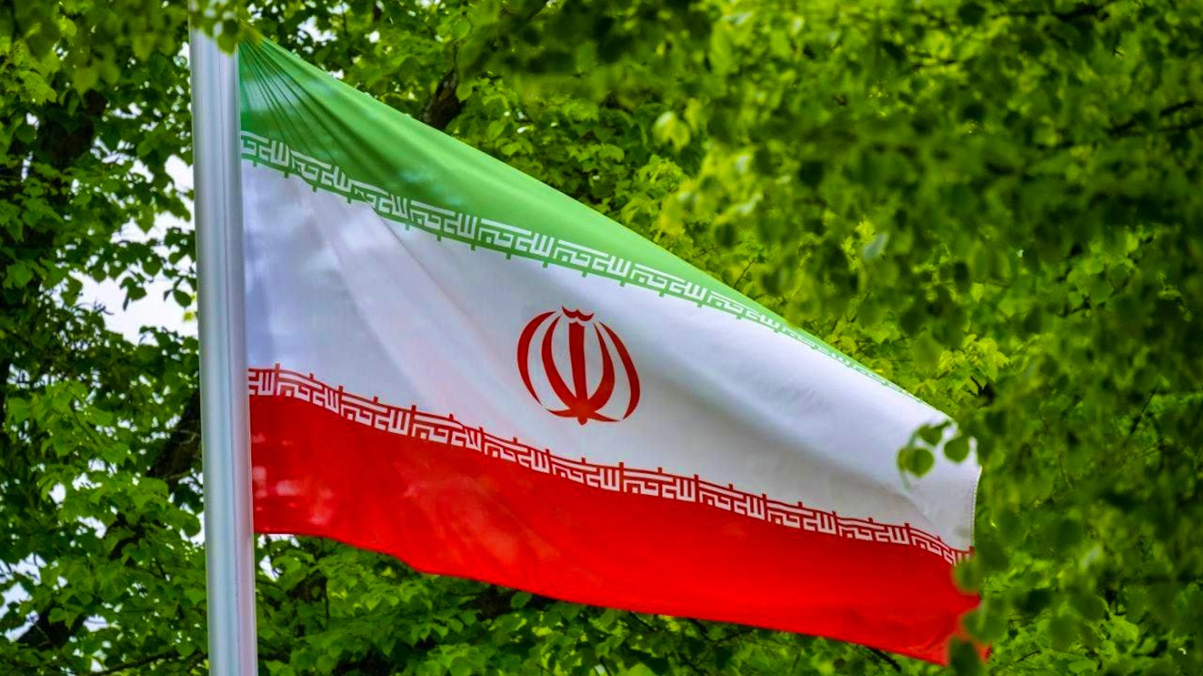 ARCHIVE - The flag of the Islamic Republic of Iran flies in the wind. Photo: Monika Skolimowska/dpa