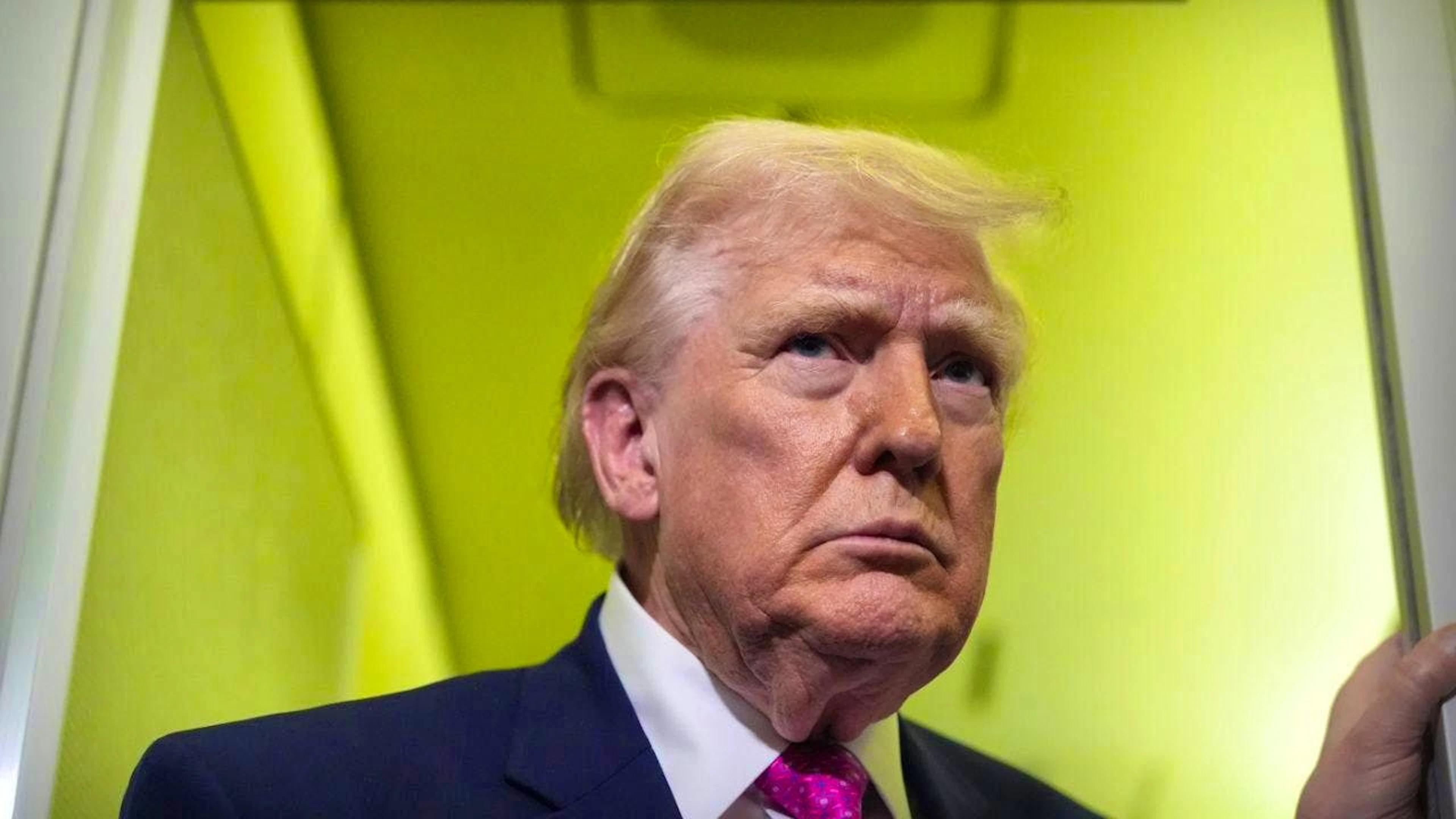 ARCHIVE - US President Donald Trump speaks to reporters. Photo: Mark Schiefelbein/AP/dpa
