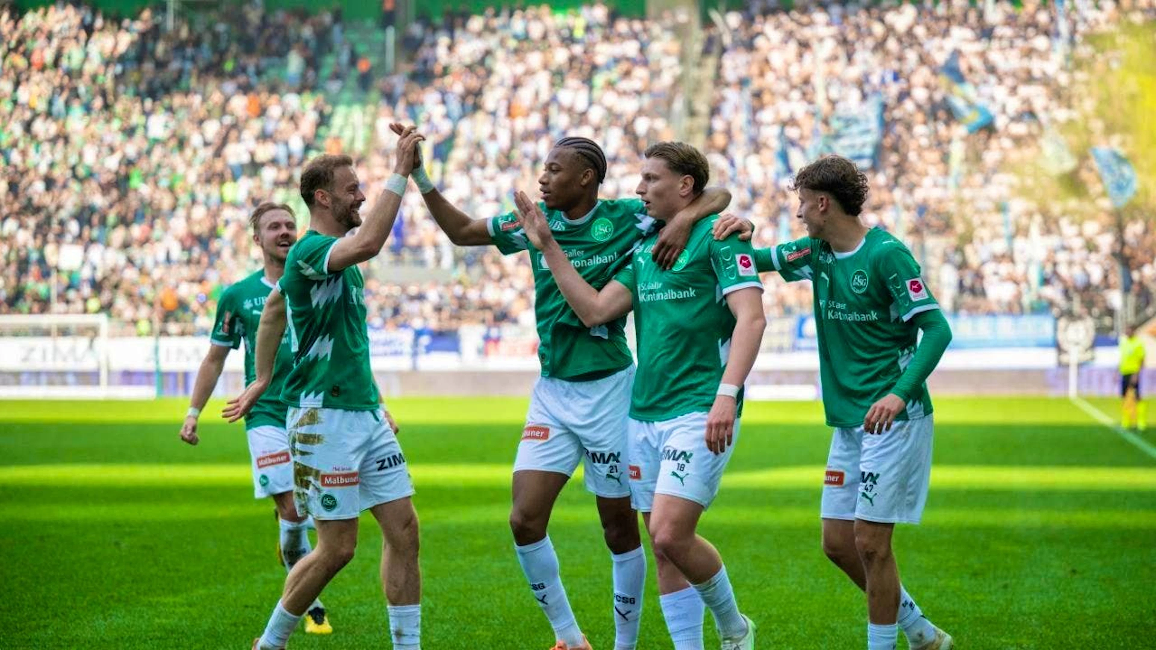 St. Gallen's scorer of the winning goal Alessandro Vogt (2nd from right) celebrates