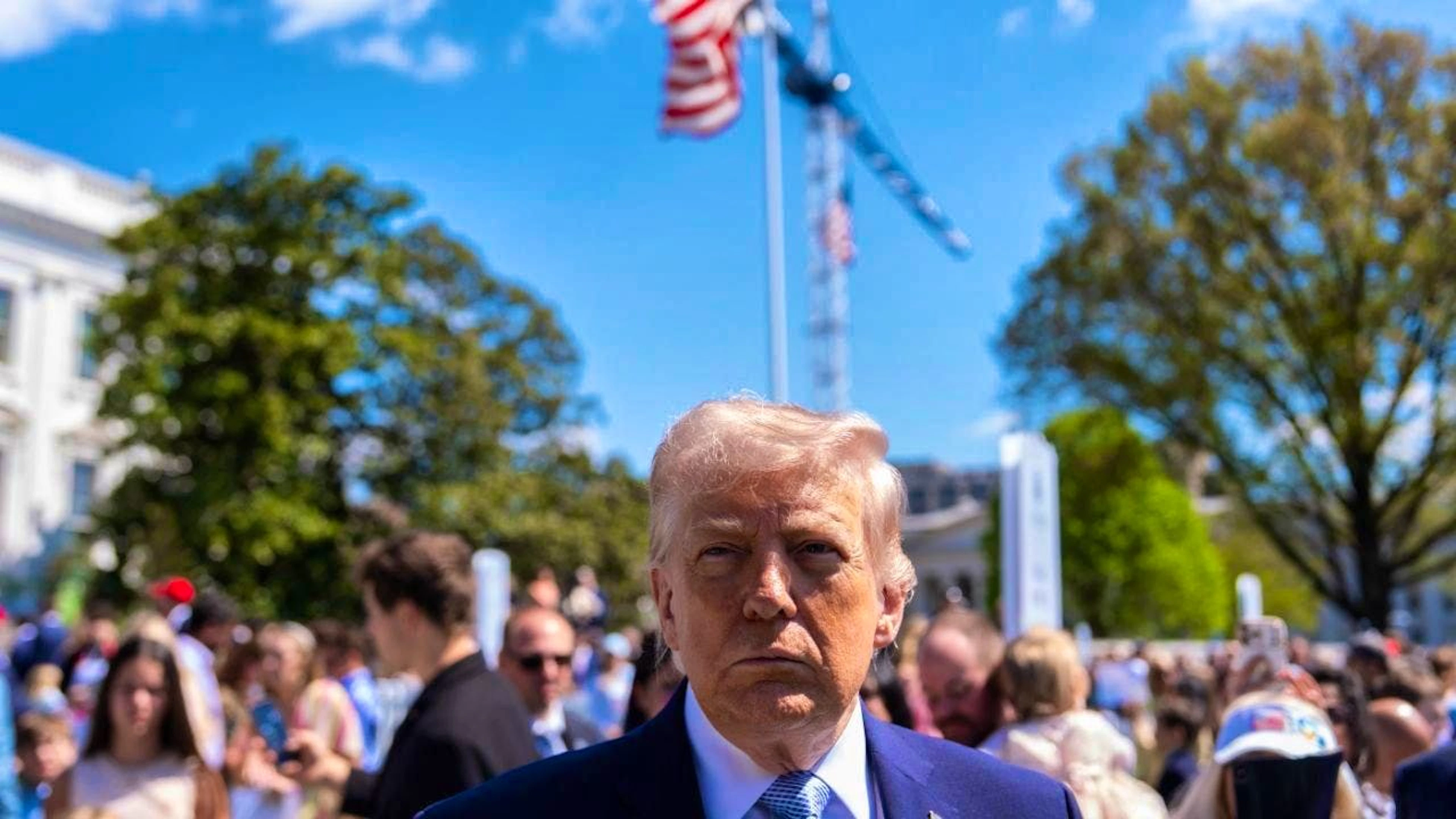 US President Donald Trump speaks to reporters during the White House Easter Egg Roll on the South Lawn of the White House. Photo: Julia Demaree Nikhinson/AP/dpa