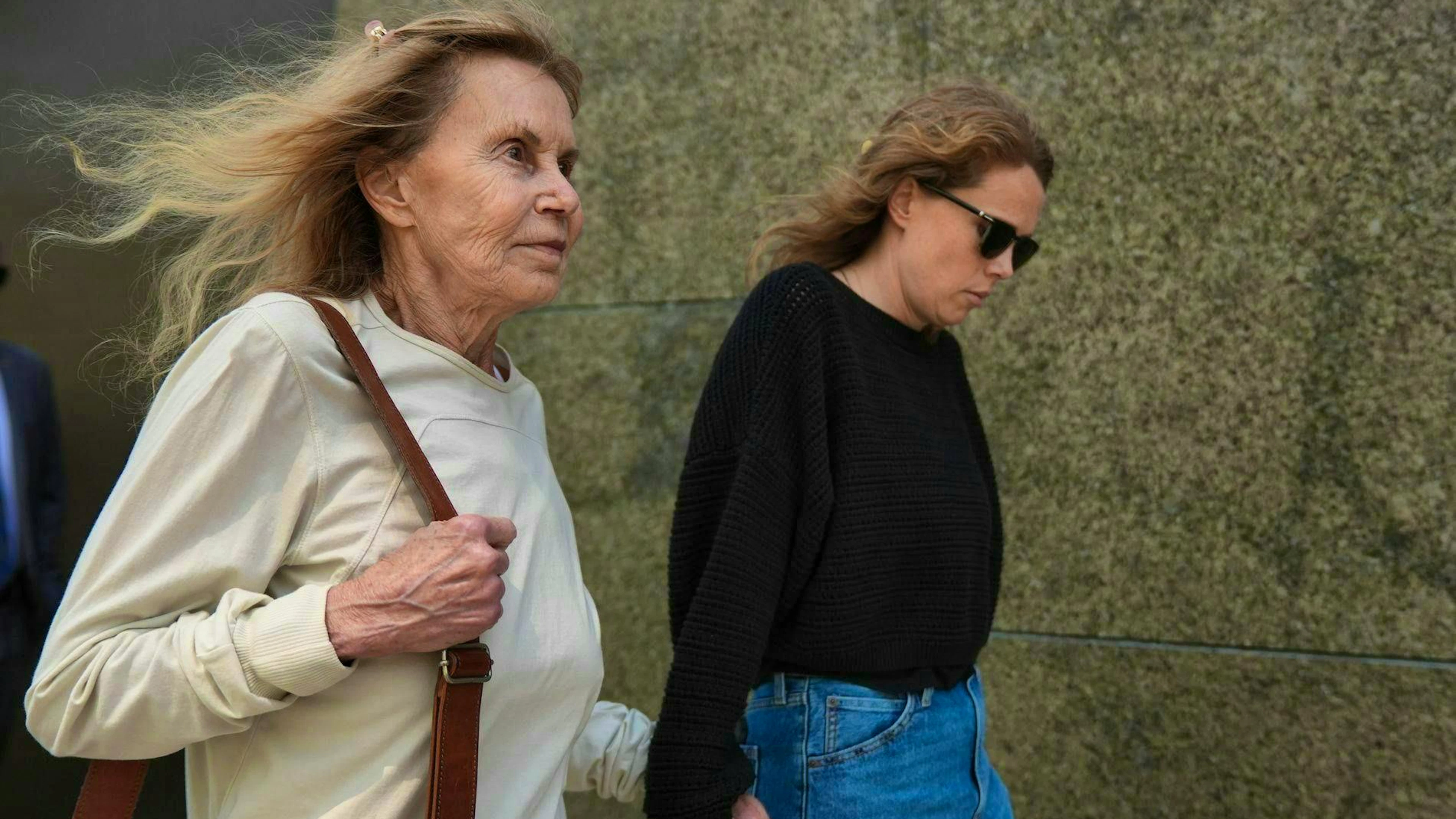 Matthew Perry's mother, Suzanne Morrison (l.), leaves the court in Los Angeles after the verdict was announced on Wednesday.