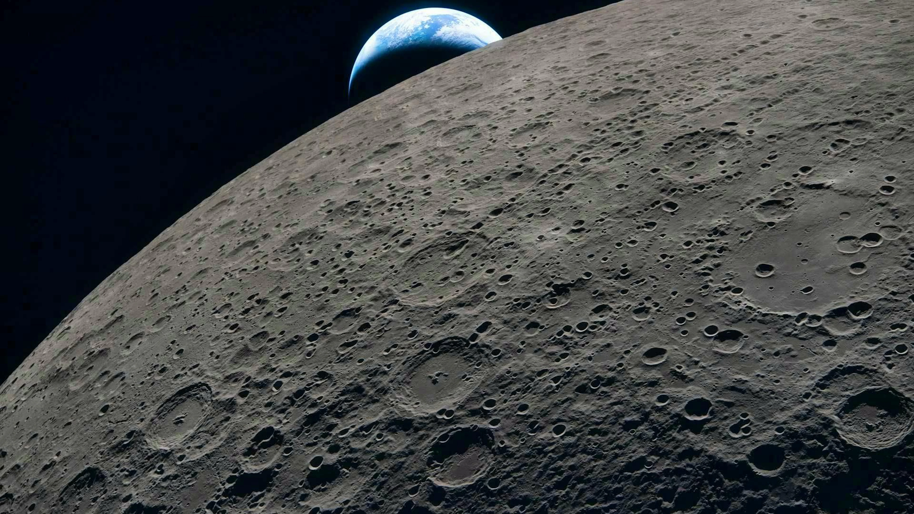 The lunar surface in sharp detail as the distant Earth sets in the background. This image was taken shortly before the Orion and its crew plunged behind the moon and lost contact with Earth for 40 minutes before emerging on the other side.