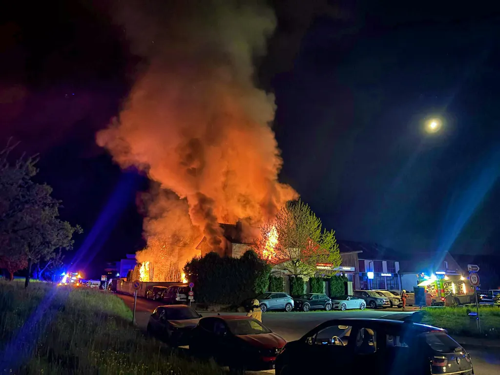 Apartment building catches fire at night - millions in damage