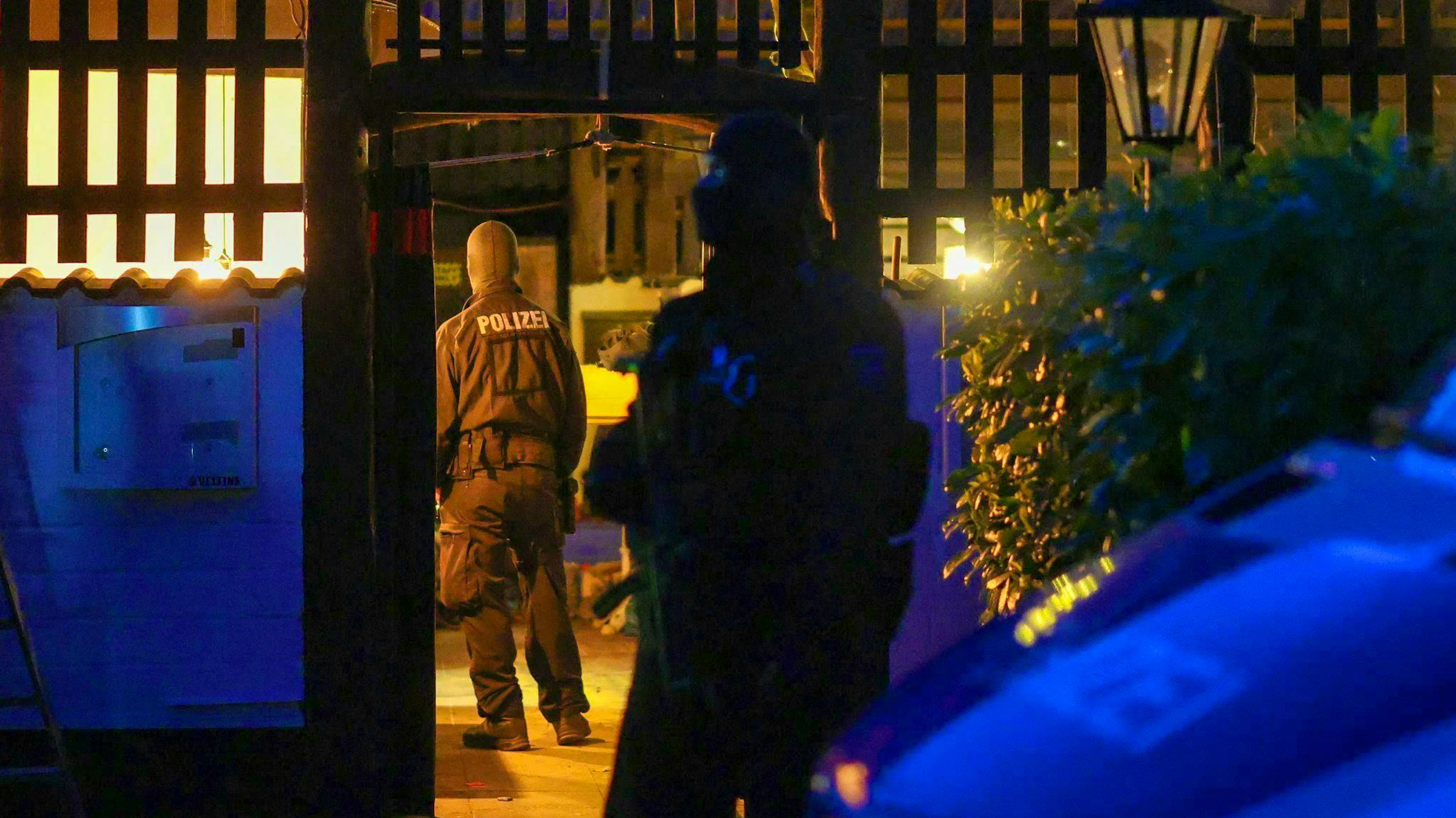 Police officers search the Hells Angels clubhouse in Hilden.