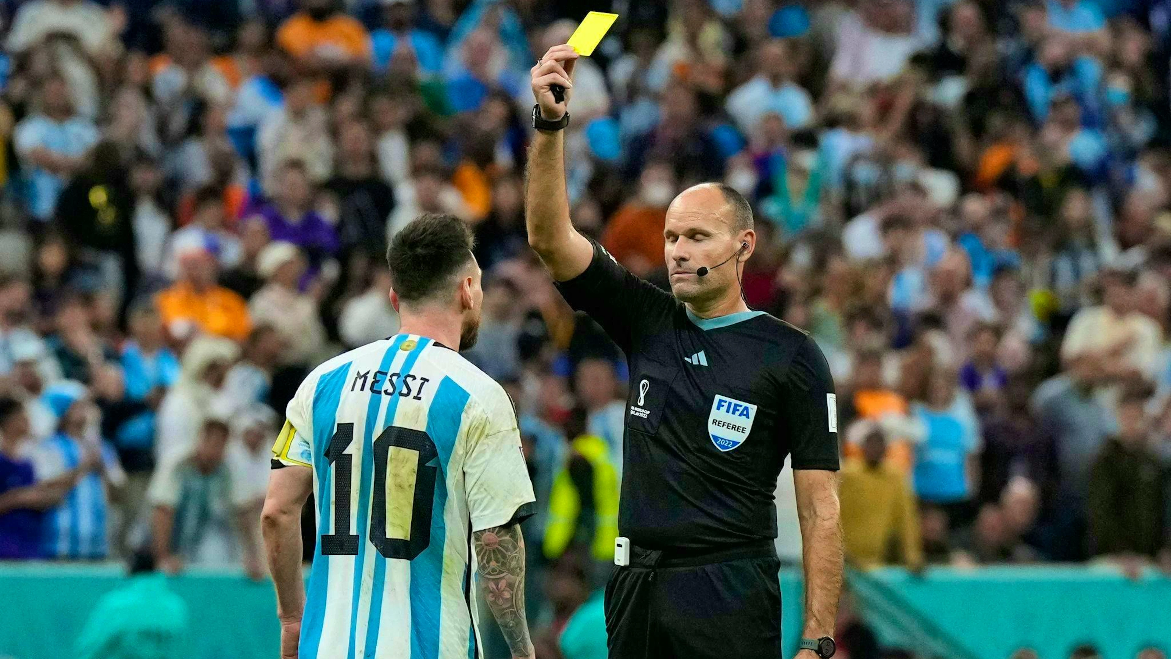 Less risk of a yellow card: Here, Argentina's Lionel Messi (l) is cautioned by referee Antonio Mateu Lahoz at the 2022 World Cup. (archive picture)