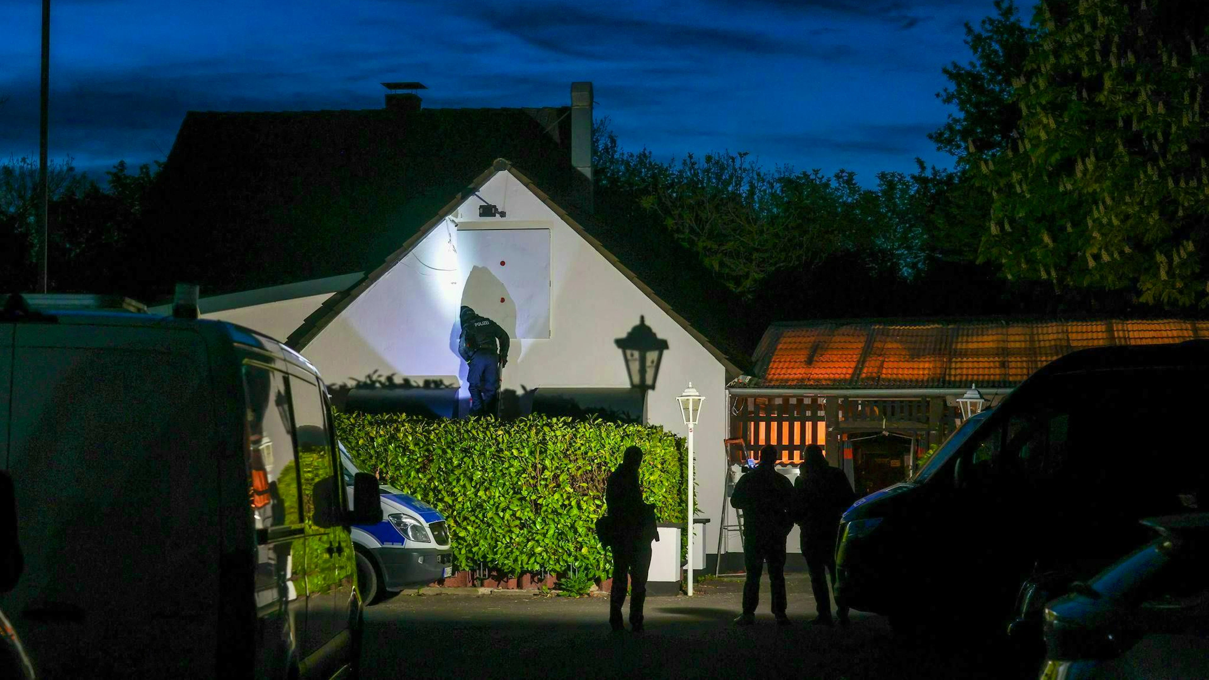 In the early morning, officers searched numerous homes and businesses. 