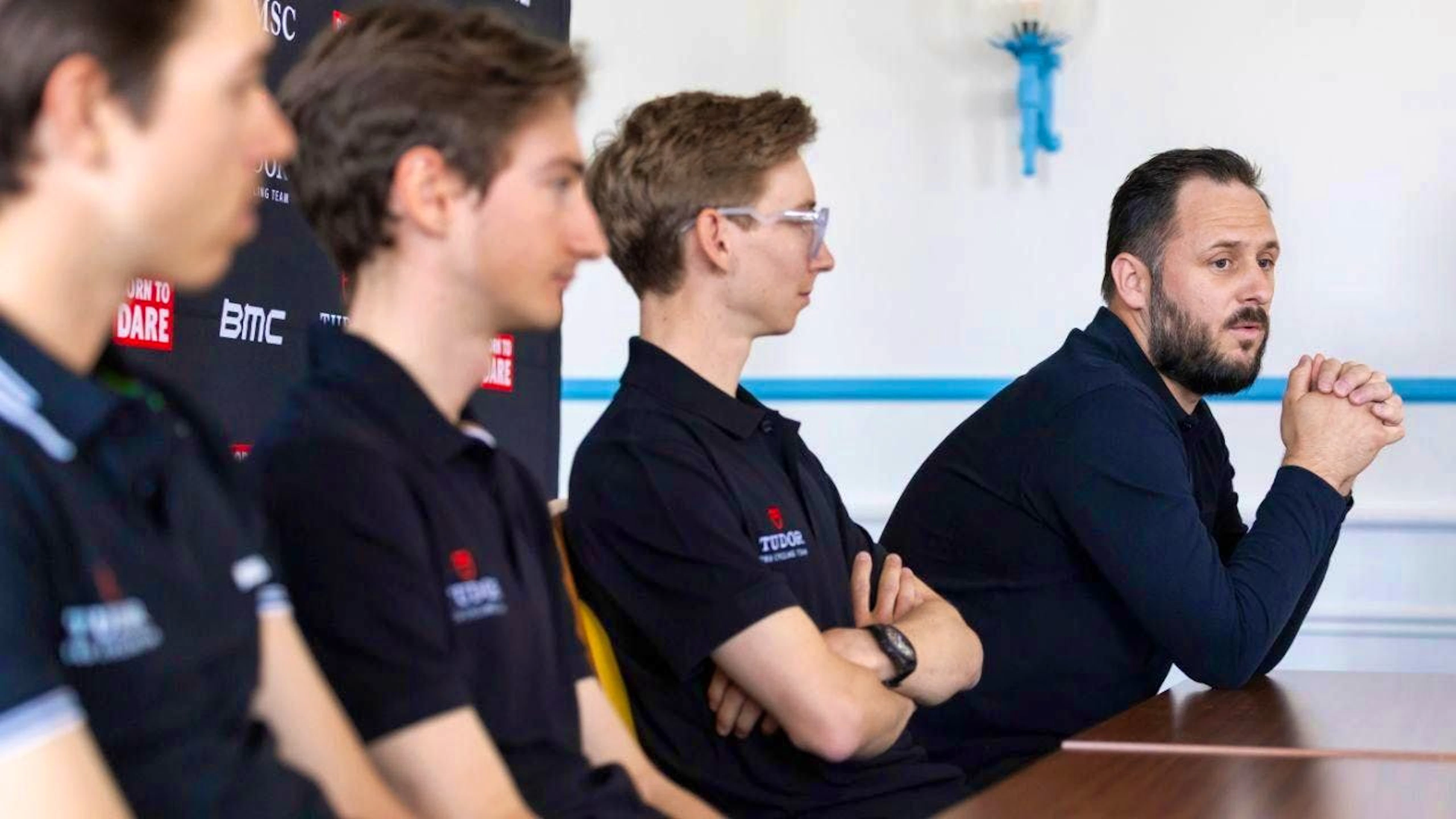Morgan Lamoisson (right), sports director of Equipe Tudor, explains the team's goals at the Tour de Romandie