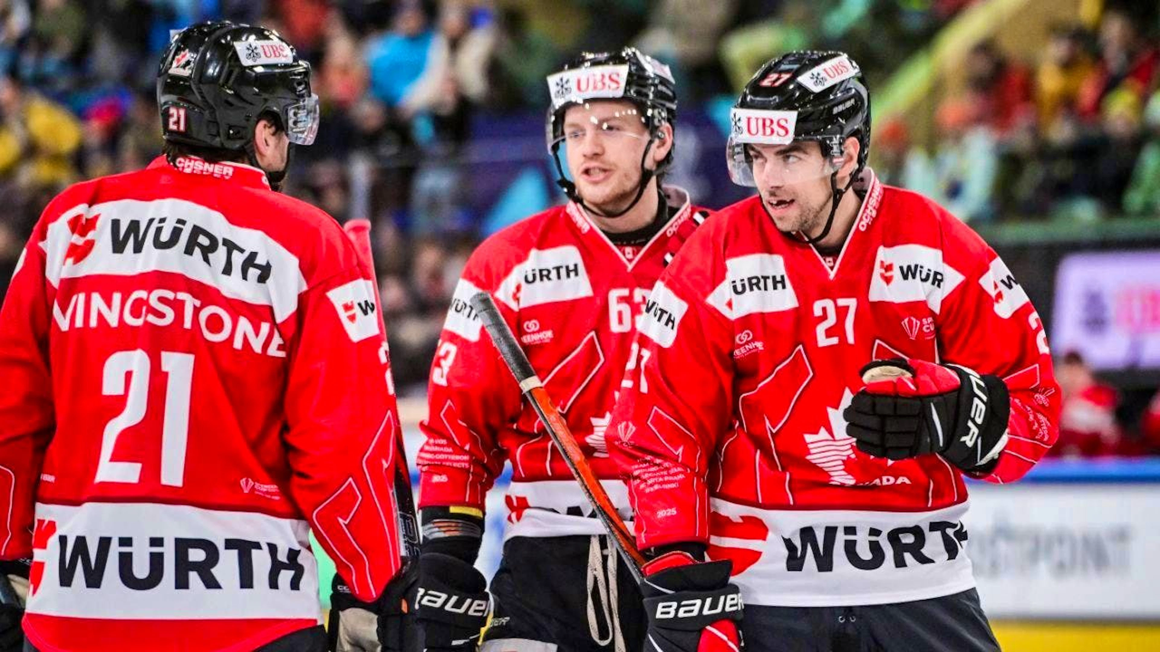 Team Canada, pictured here with ZSC forward Derek Grant (right), has been an integral part of the Spengler Cup since 1984