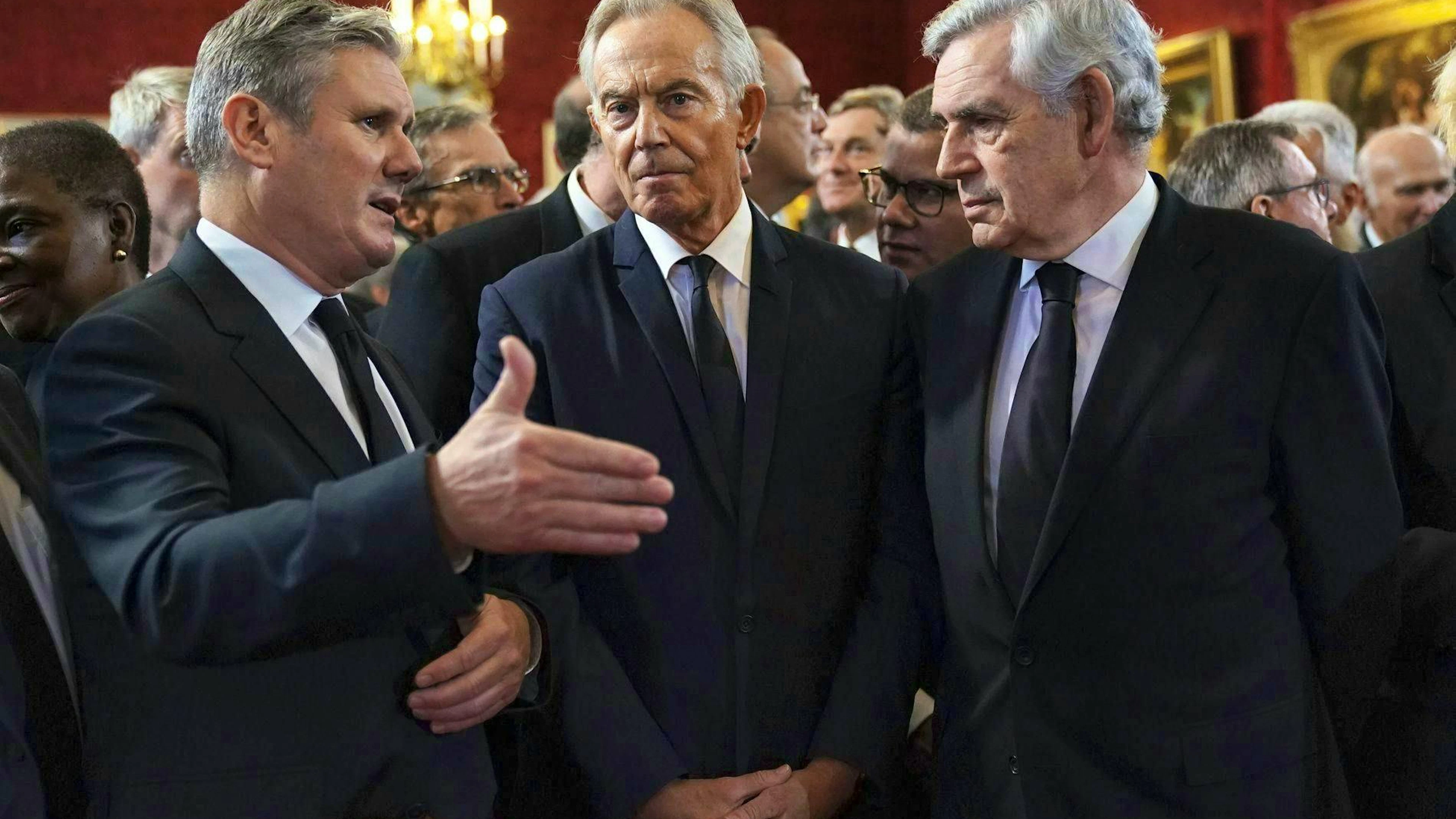 Keir Starmer (left) in conversation with Labour grandees Tony Blair (center) and Gordon Brown, on the day of Charles' proclamation as British King in 2022.