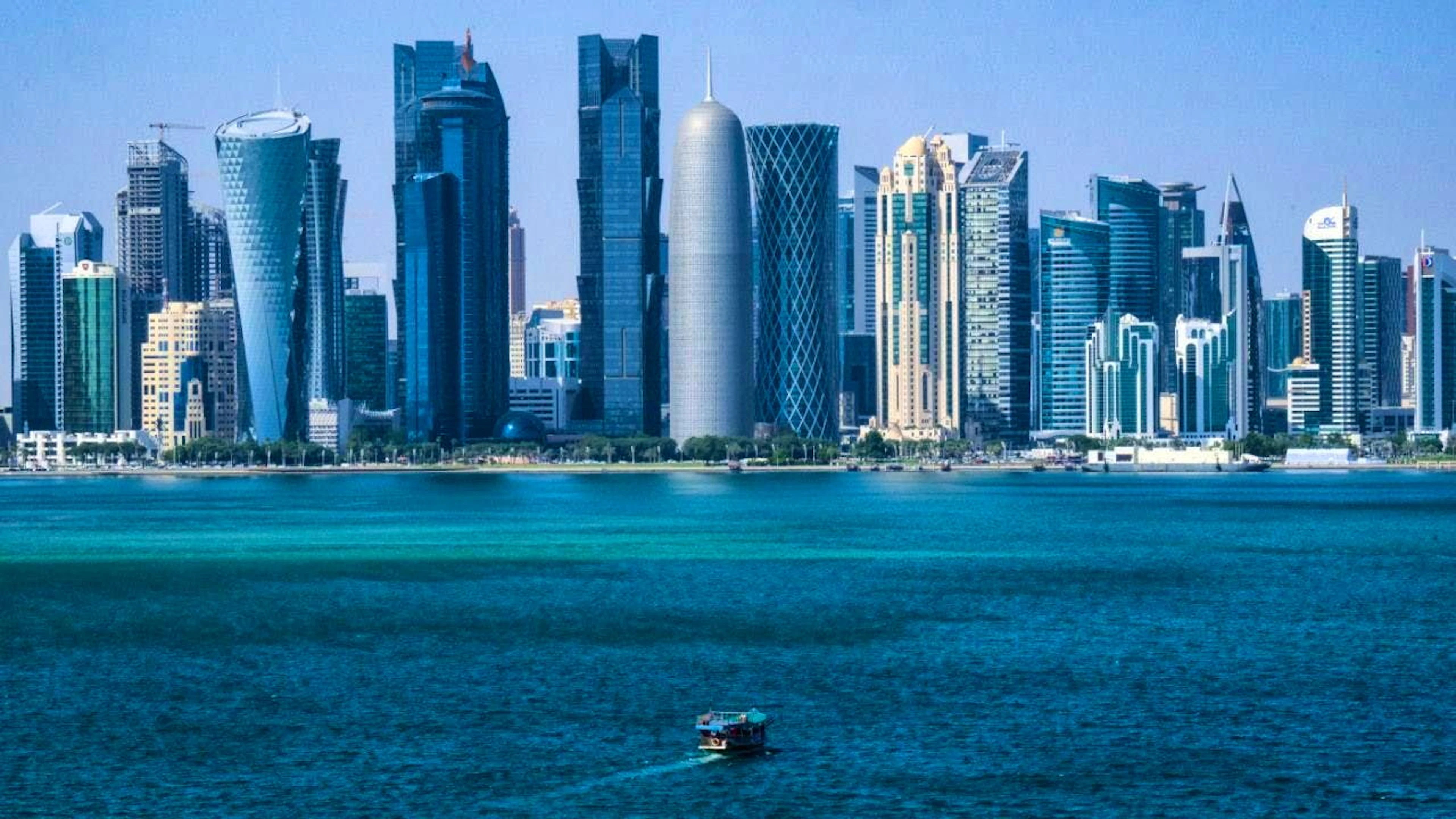 ARCHIVE - A boat passes in front of the skyline of Doha (Qatar). Photo: Bernd von Jutrczenka/dpa