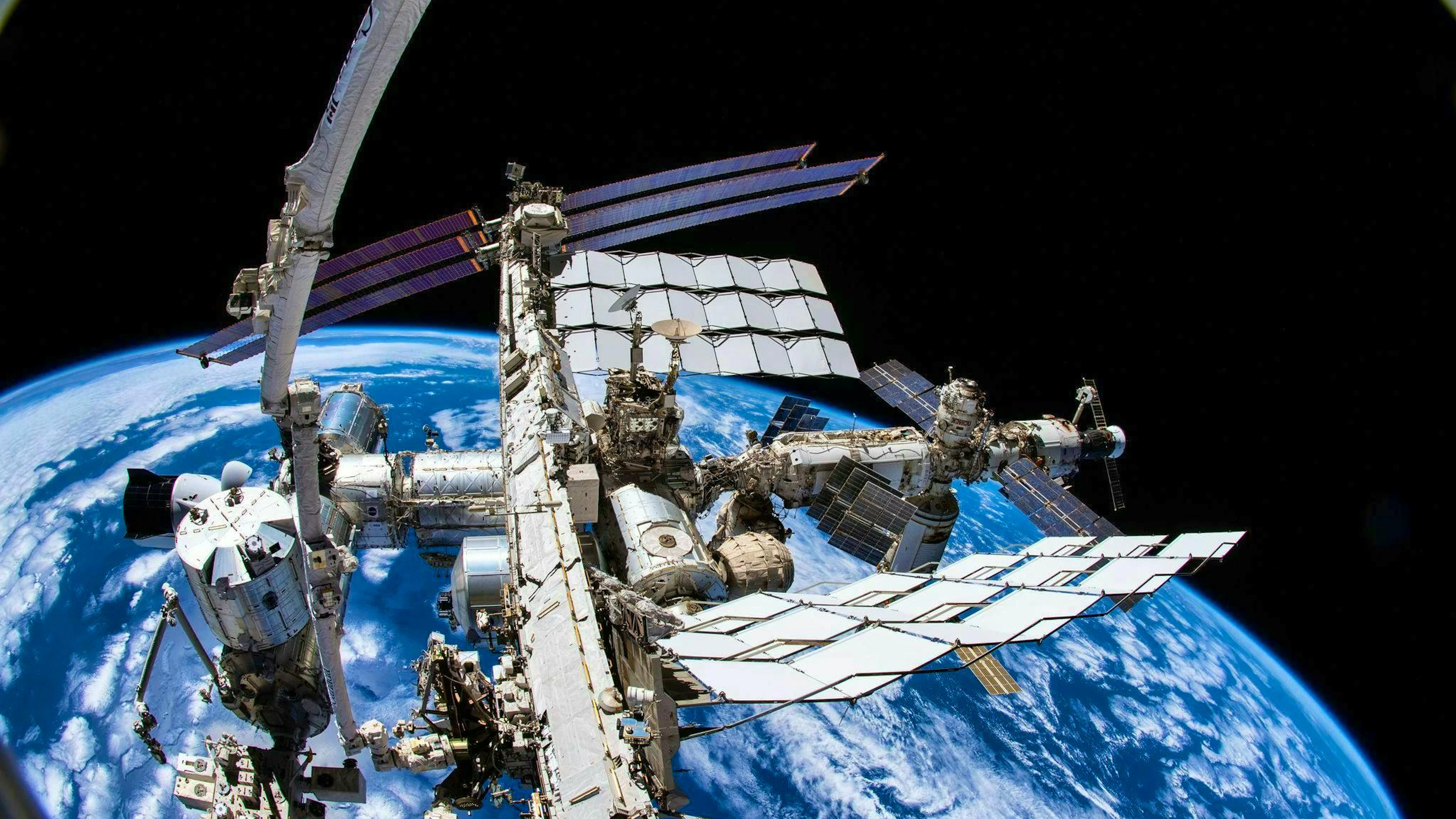 The ISS is orbiting at an altitude of around 400 kilometers.