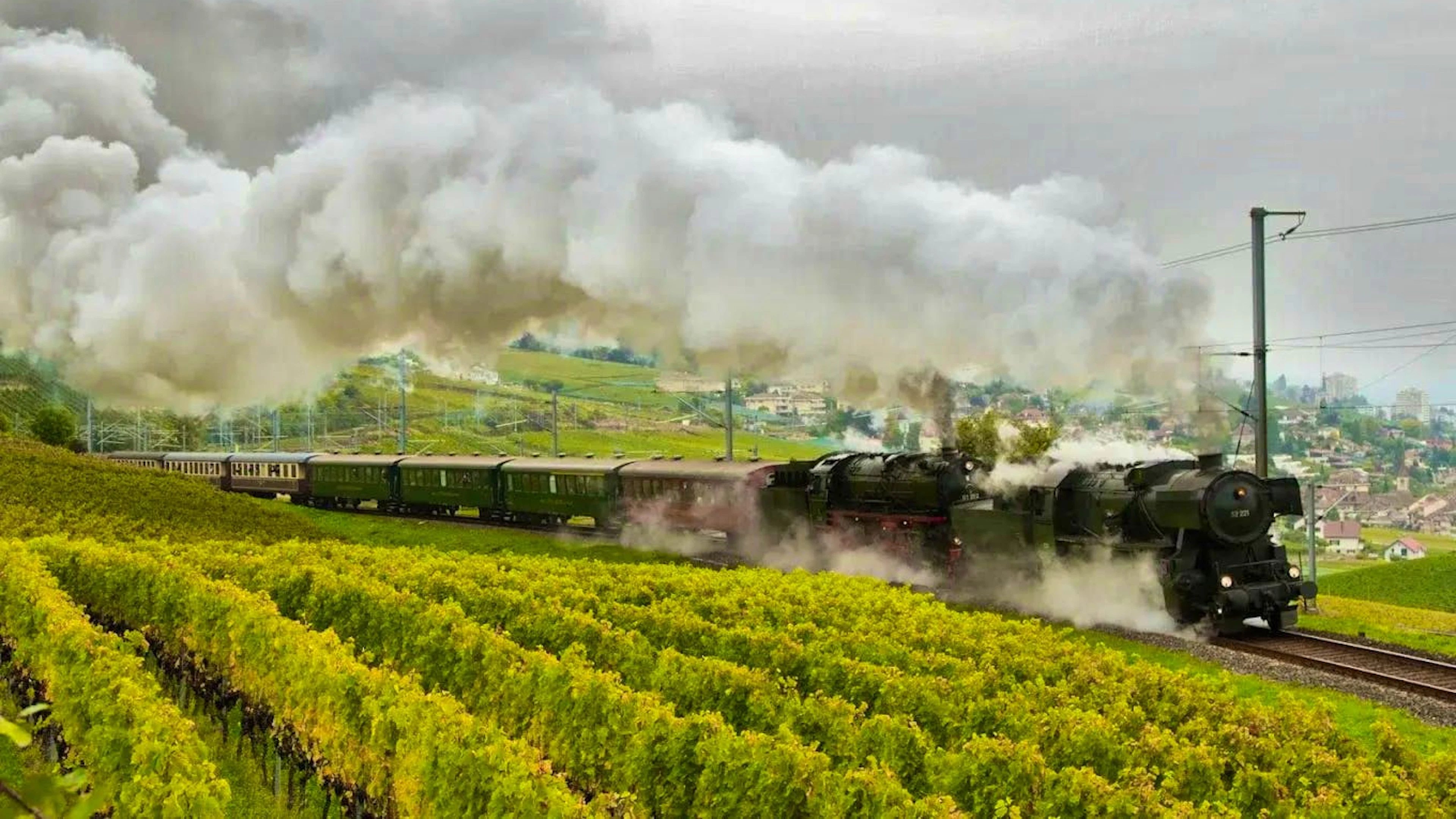 The Vapeur Val-de-Travers steam train winds its way through the vineyards of Vaud and brings the great days of steam railroads back to life.