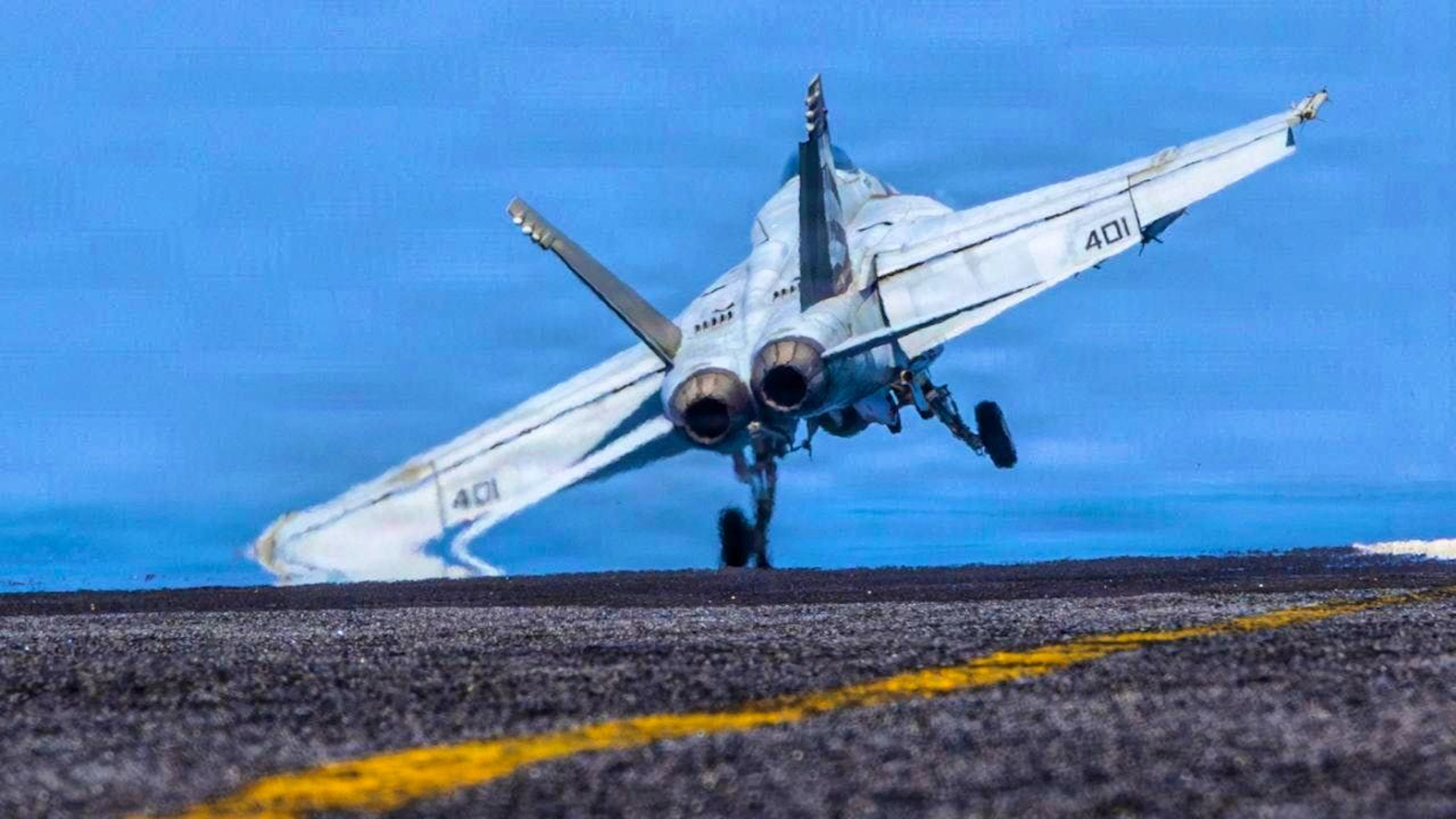 This image provided by US Central Command shows an F/A-18E Super Hornet taking off from the USS Abraham Lincoln (CVN 72) in support of Operation Epic Fury.