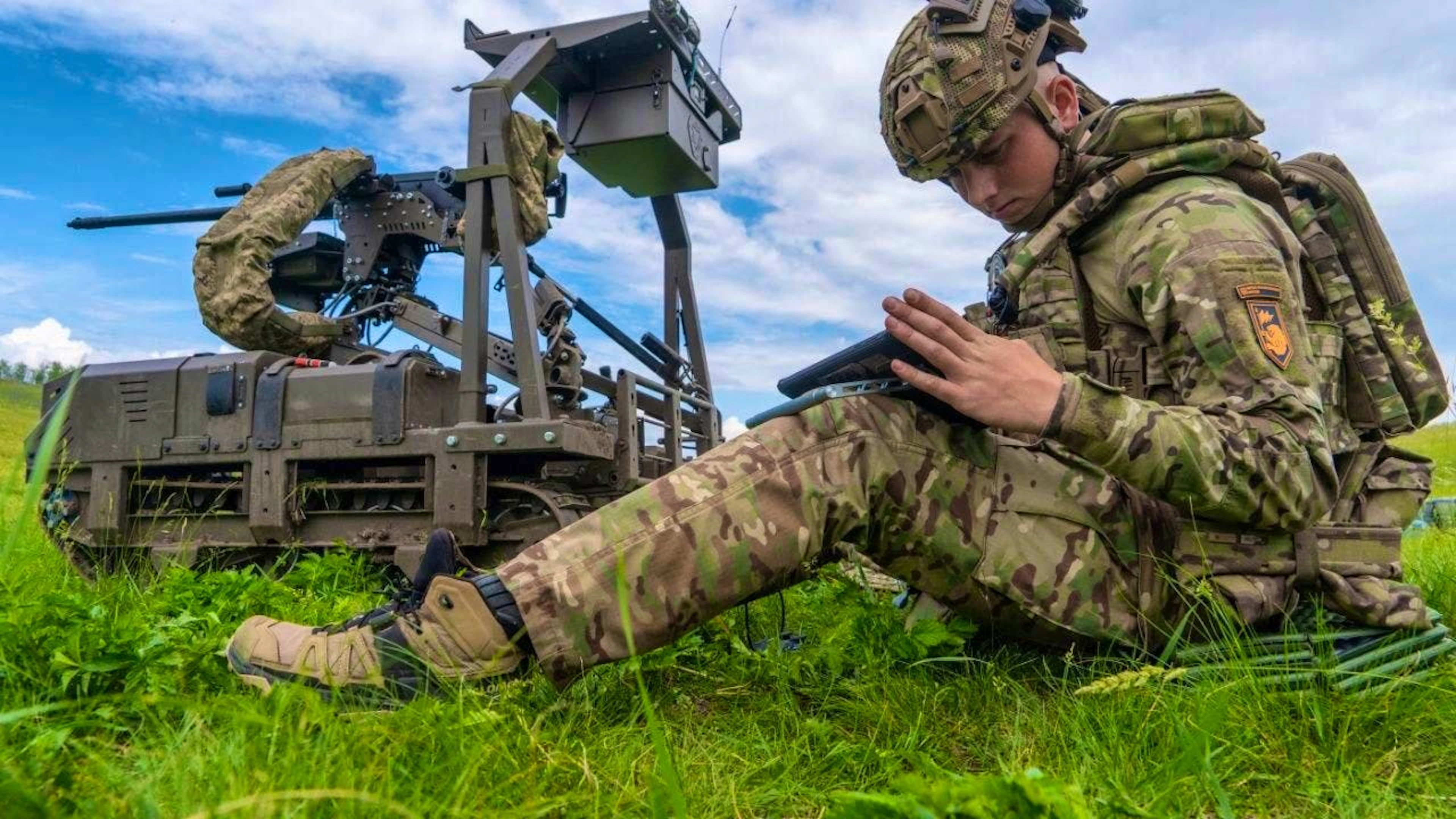 ARCHIVE - A Ukrainian soldier from the Cerberus unmanned ground systems company of the 60th separate mechanized brigade of the Third Army Corps prepares for an exercise with a combat drone in the Kharkiv region of Ukraine. Photo: Andrii Marienko/AP/dpa