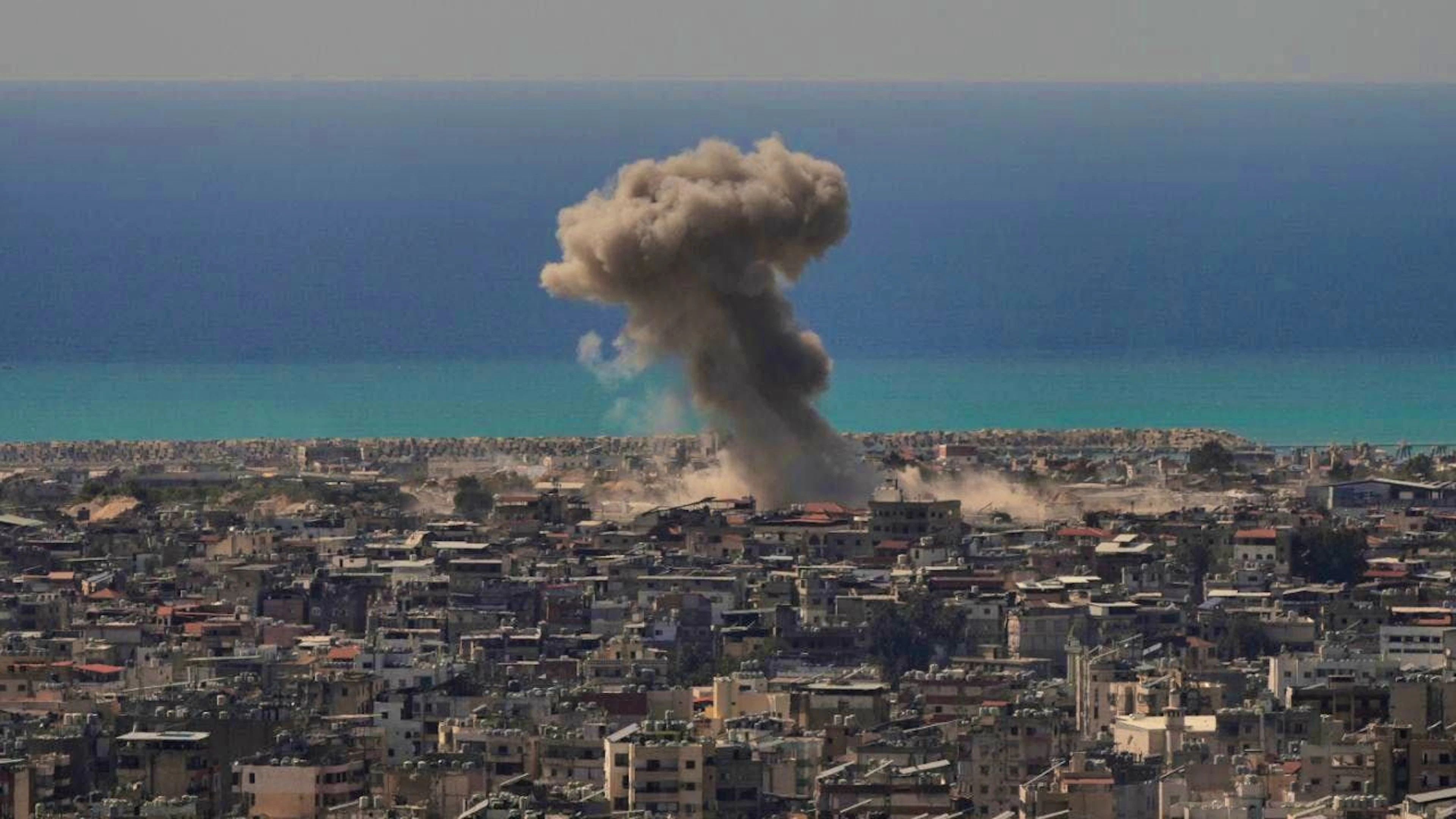ARCHIVE - Smoke rises in April after an Israeli airstrike in Dahija, a southern suburb of Beirut. Photo: Hassan Ammar/AP/dpa (archive photo)