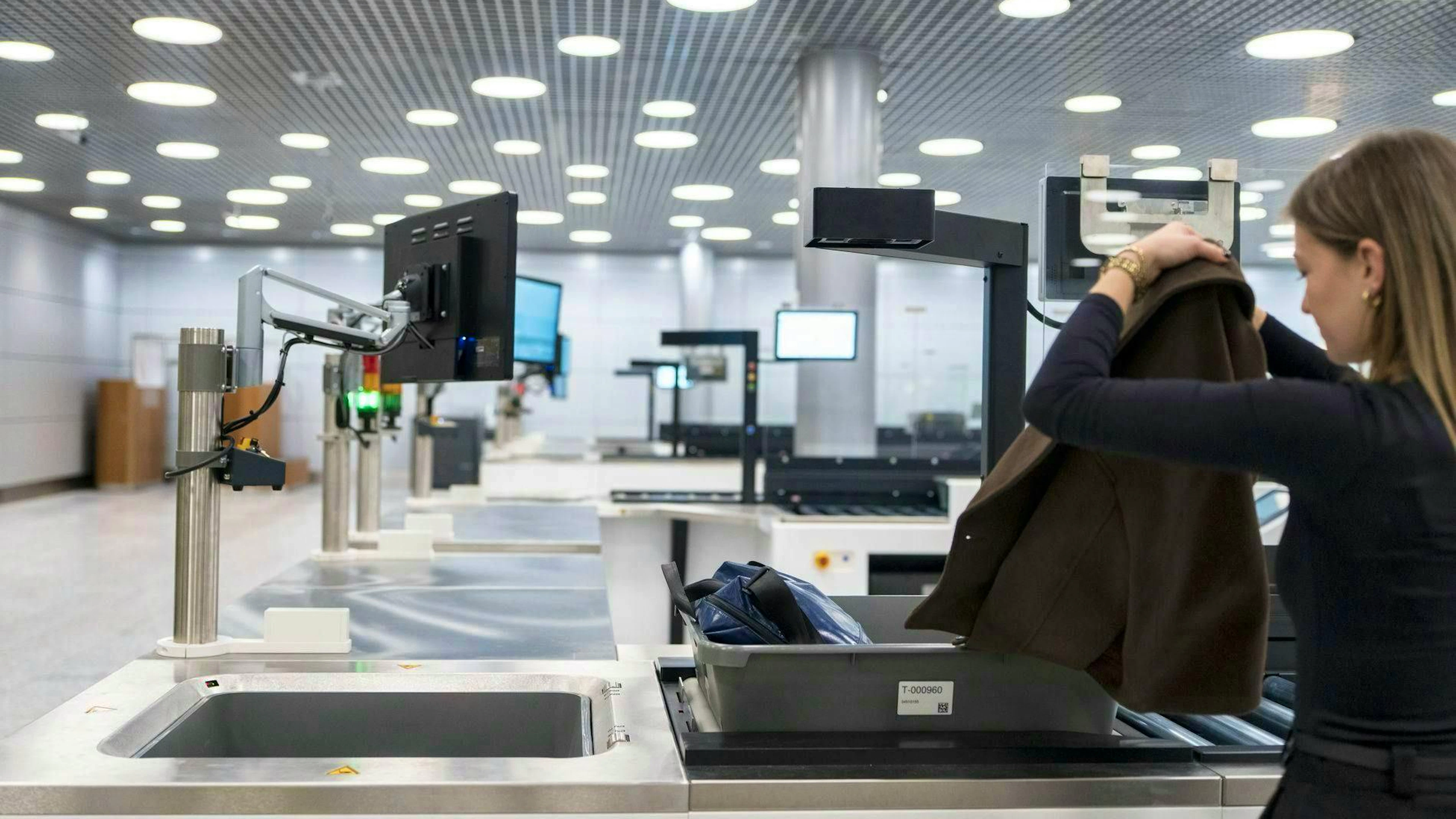 Many people stand in the wrong queue at security.