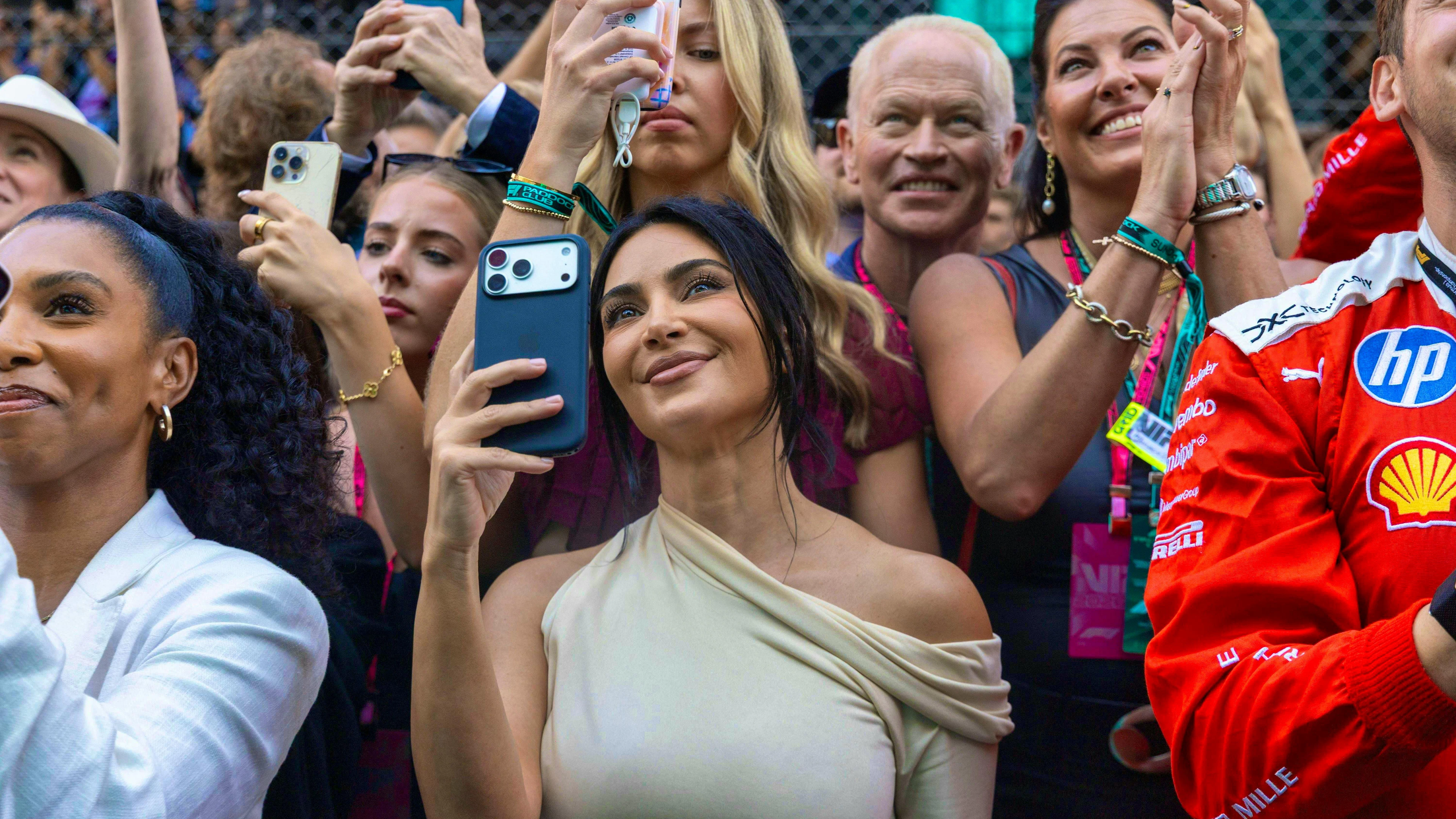Say cheese! Kim K. enjoys the race in the VIP area.