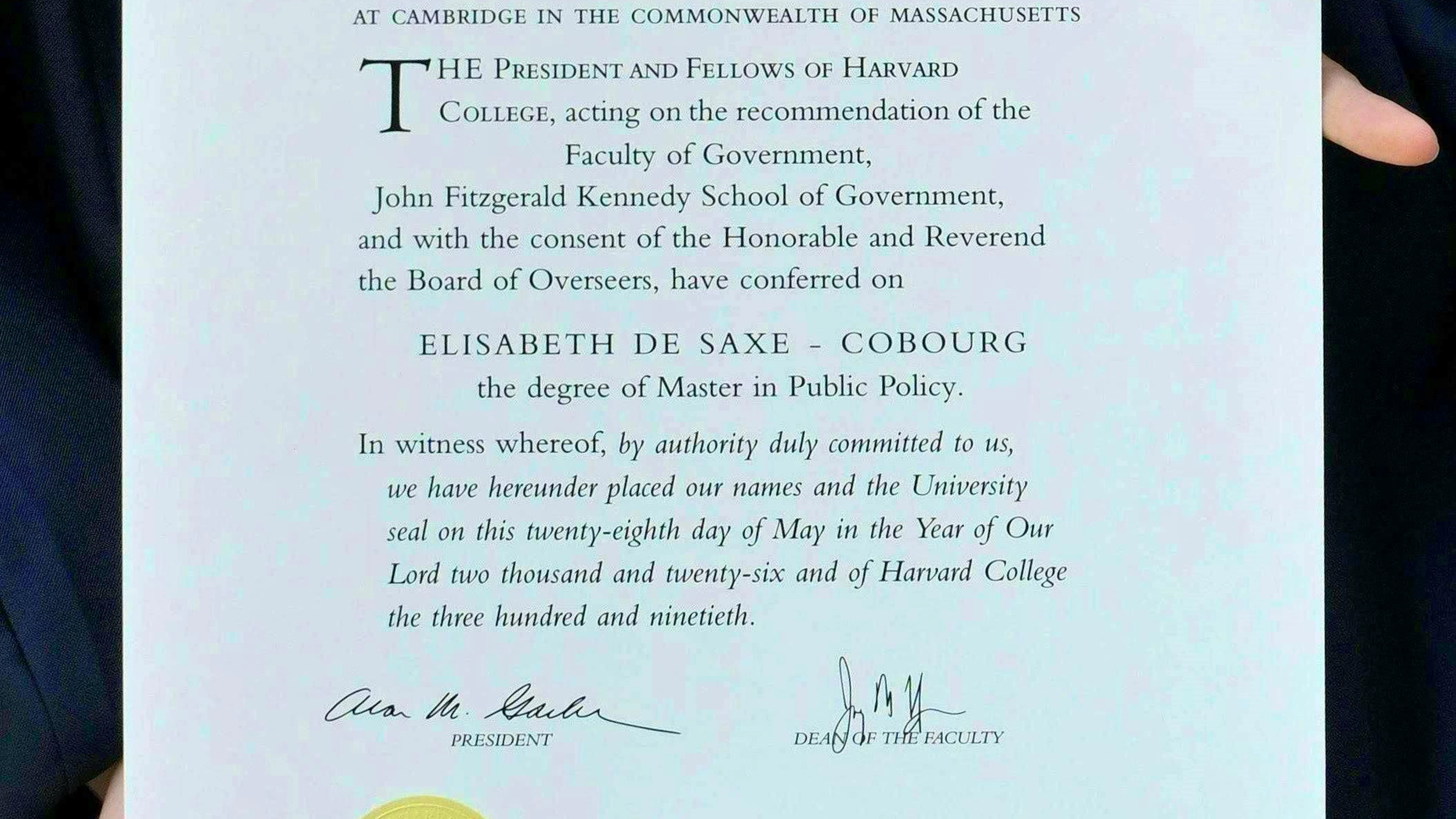 The Belgian crown princess proudly presented her university degree to the media.