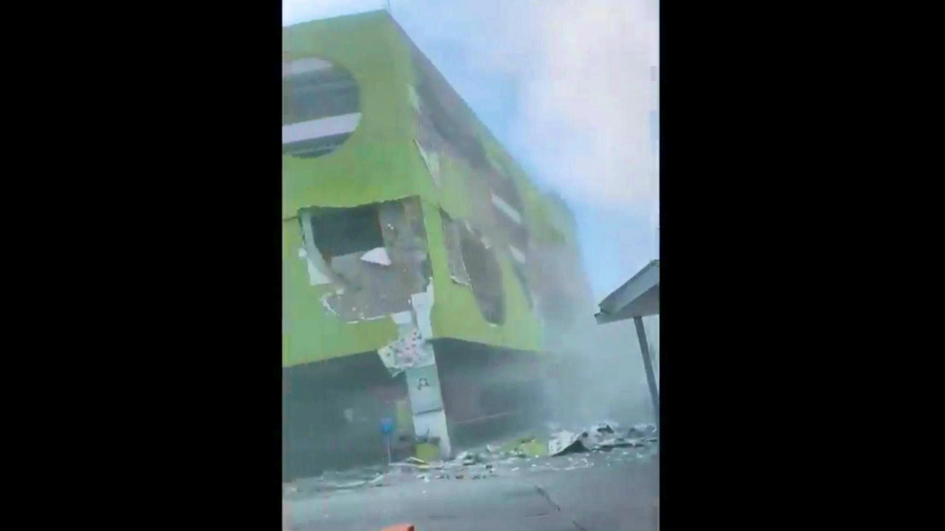 A damaged building and a lot of dust can be seen in General Santos City on the island of Mindanao.