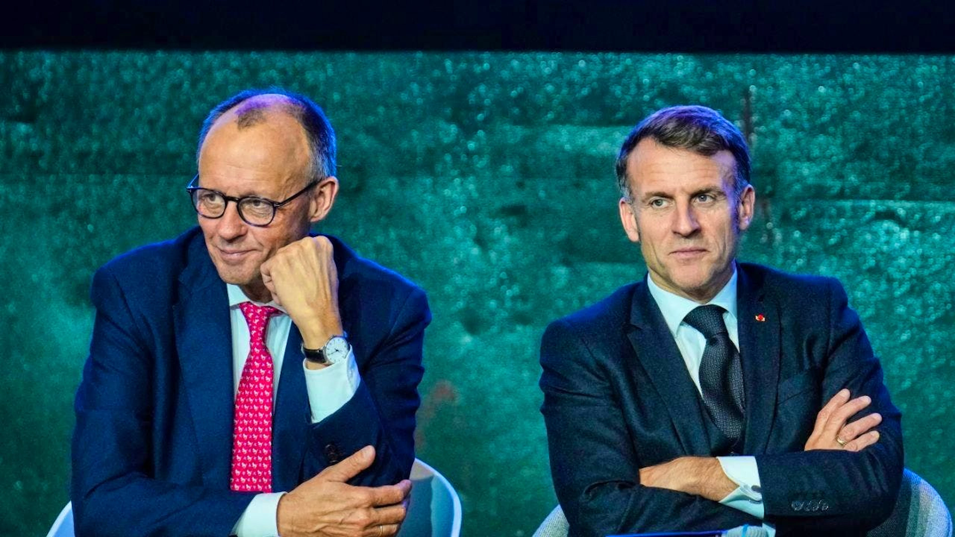 ARCHIVE - German Chancellor Friedrich Merz (l, CDU) and French President Emmanuel Macron take part in a meeting with a group of investors at the European Digital Sovereignty Summit. Photo: Ebrahim Noroozi/Pool AP/dpa