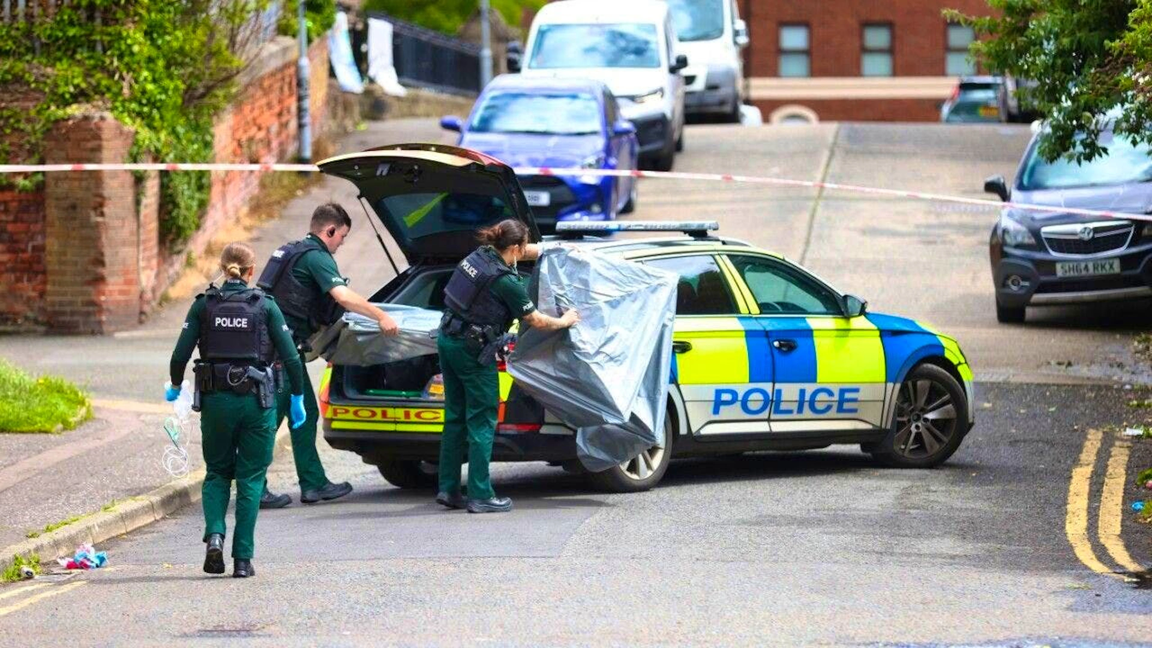 Police in Northern Ireland secure the area around the scene.