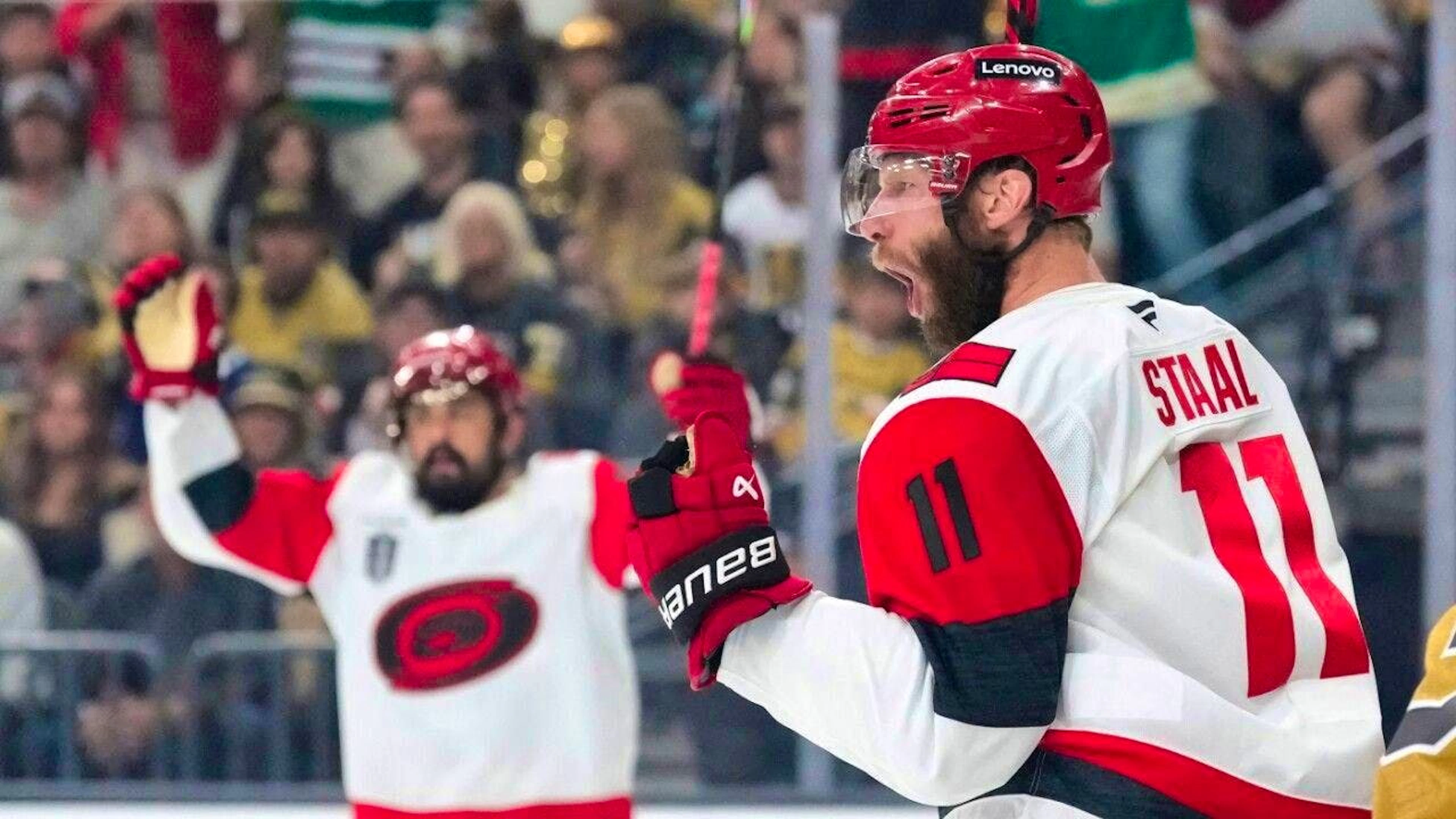 Double goal scorer Jordan Staal (number 11) screams out his joy