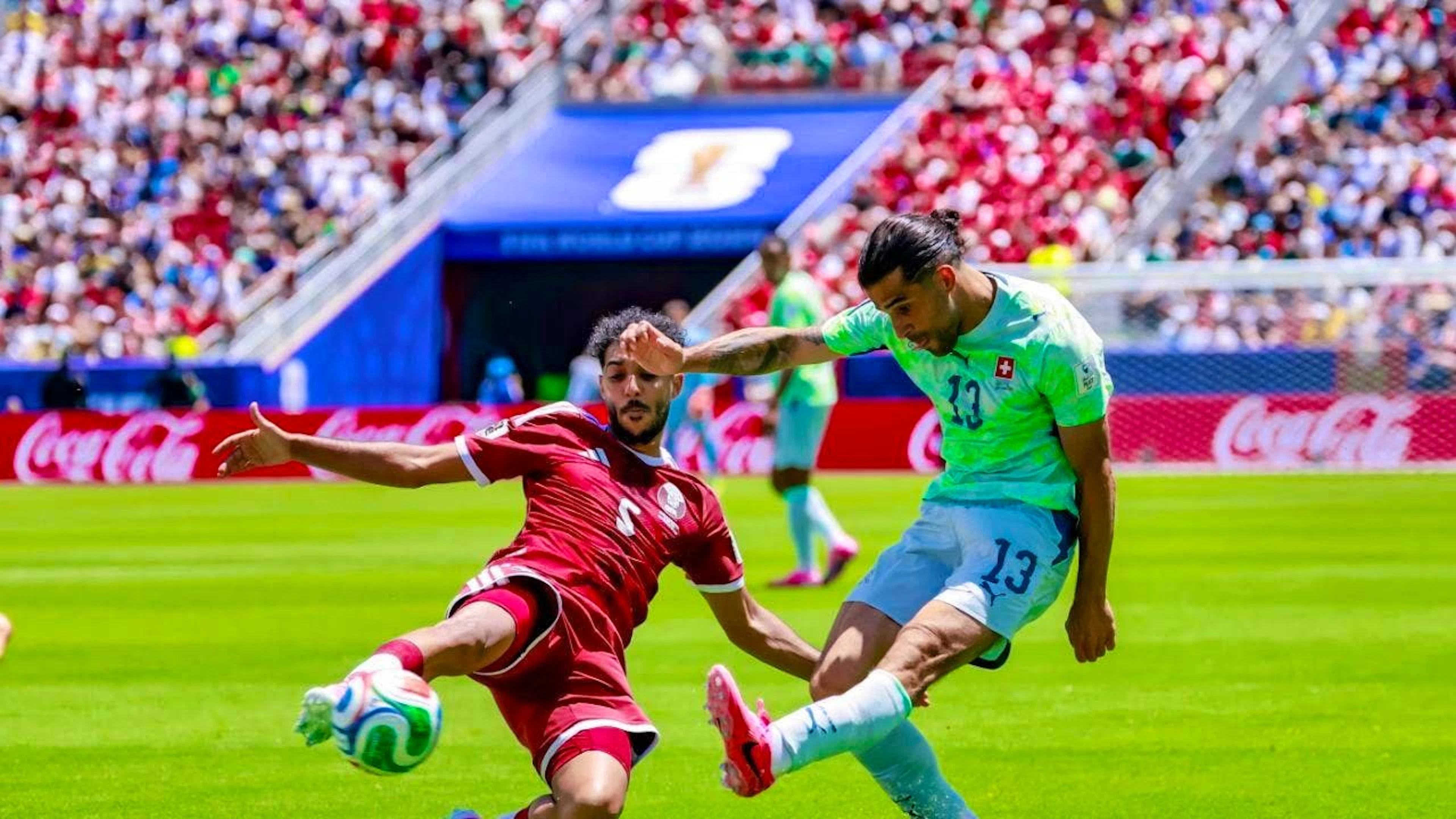 Qatar, led by Jassem Gaber, earned a surprising point against Switzerland’s Ricardo Rodriguez