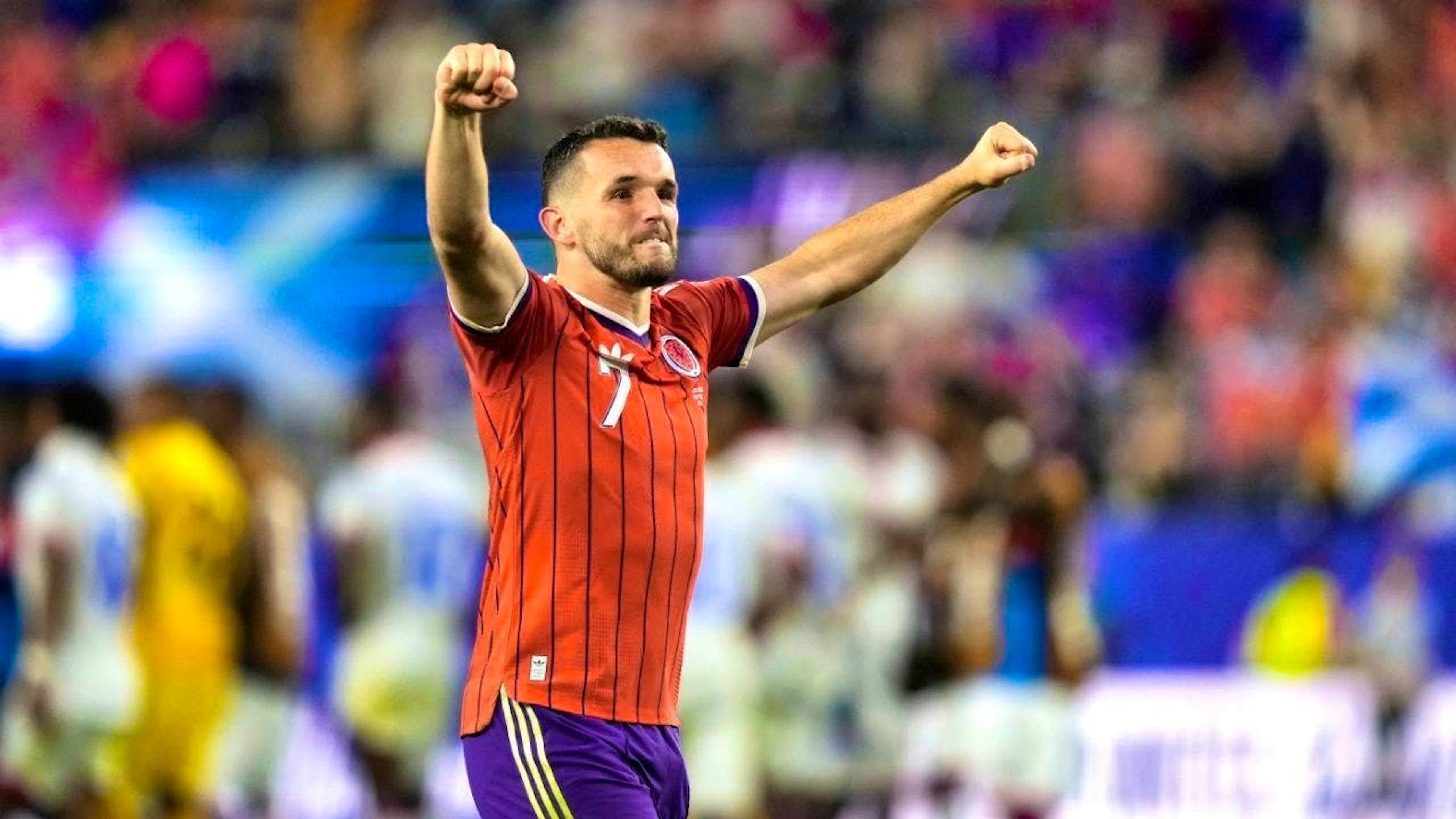 John McGinn celebrates Scotland's victory