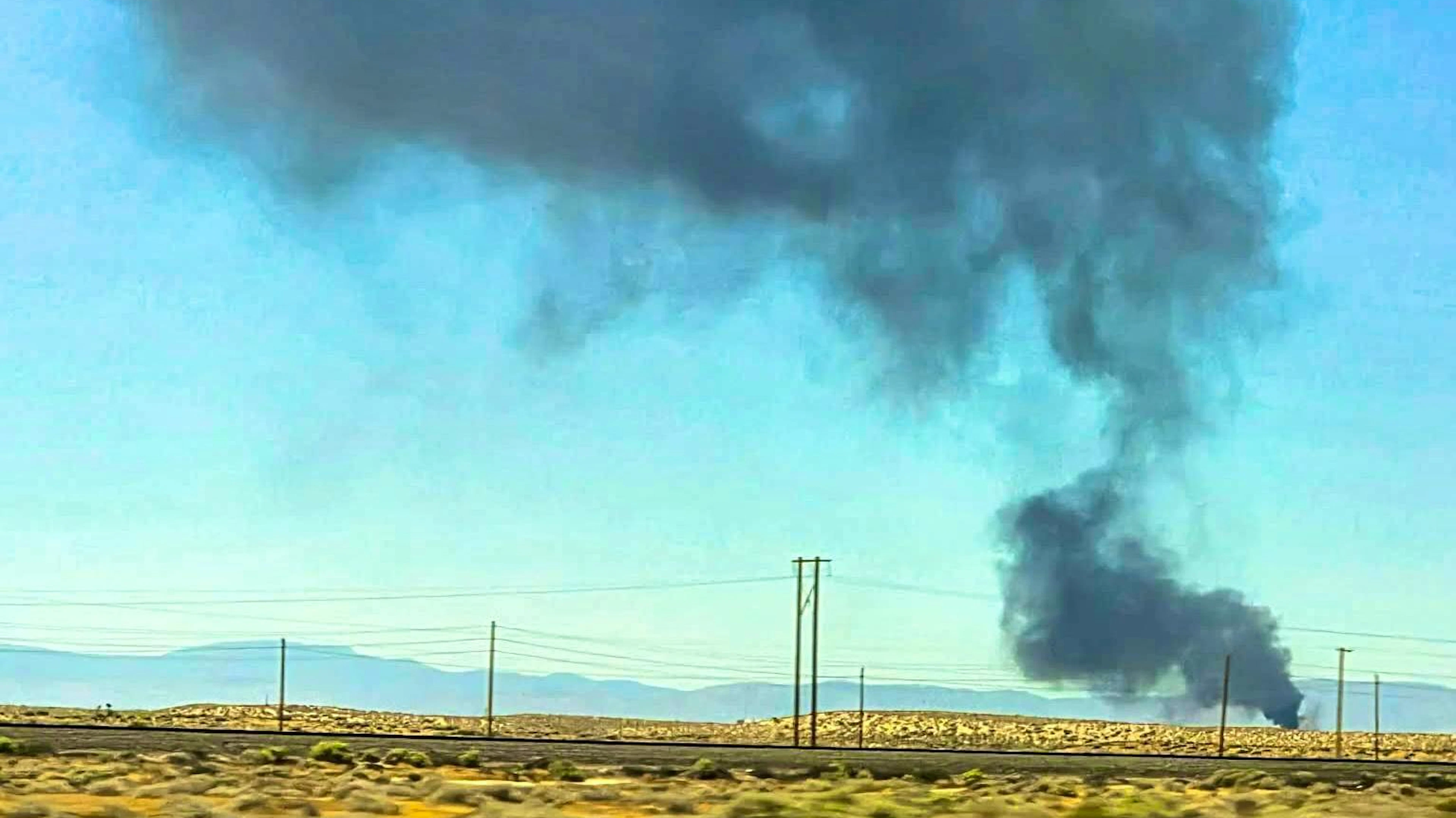 Smoke rises after the crash of a B-52 bomber in Southern California. (June 15, 2026)