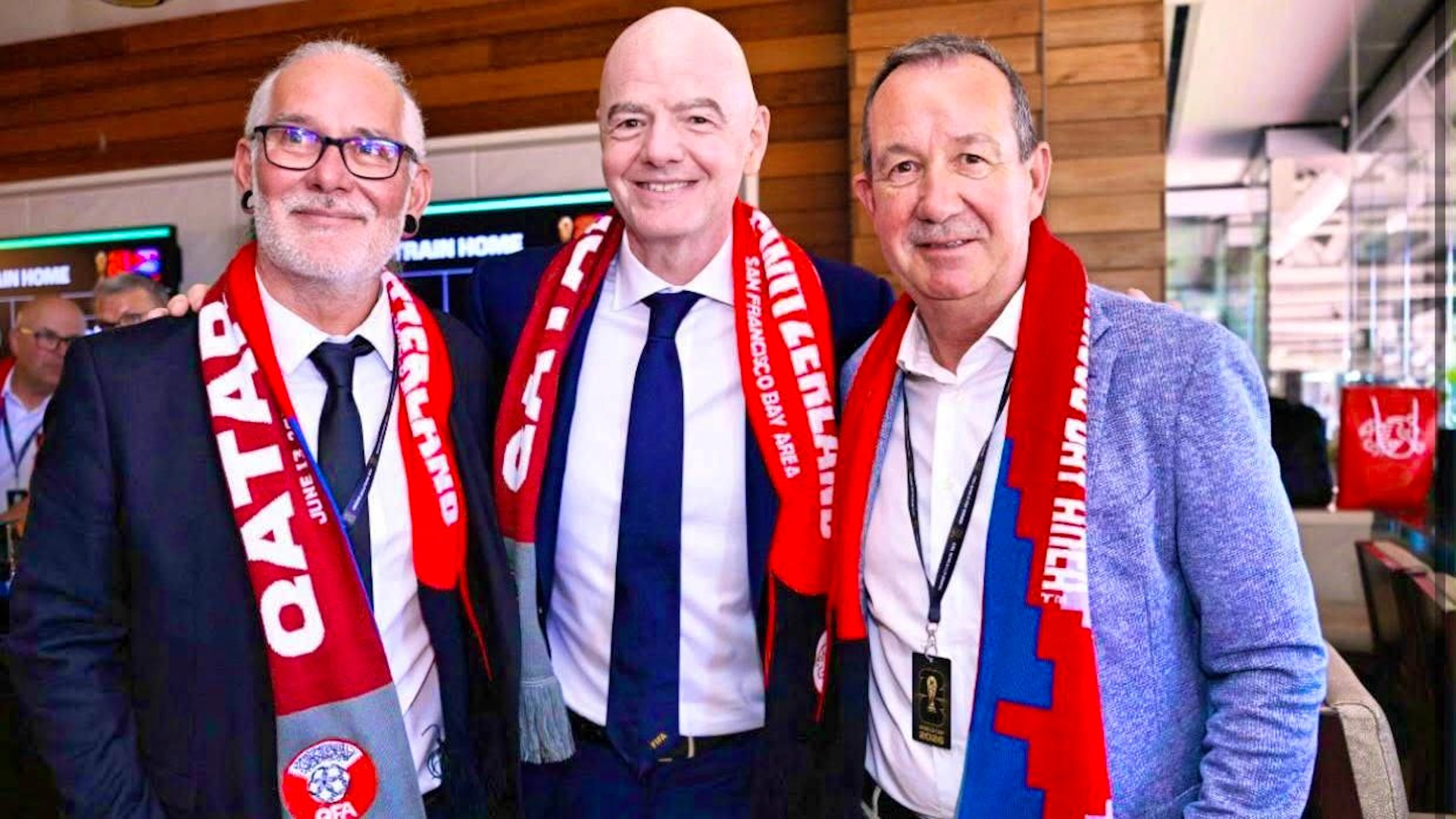 Yvan Quentin (left), Gianni Infantino, and Georges Bregy watched the match between Switzerland and Qatar.