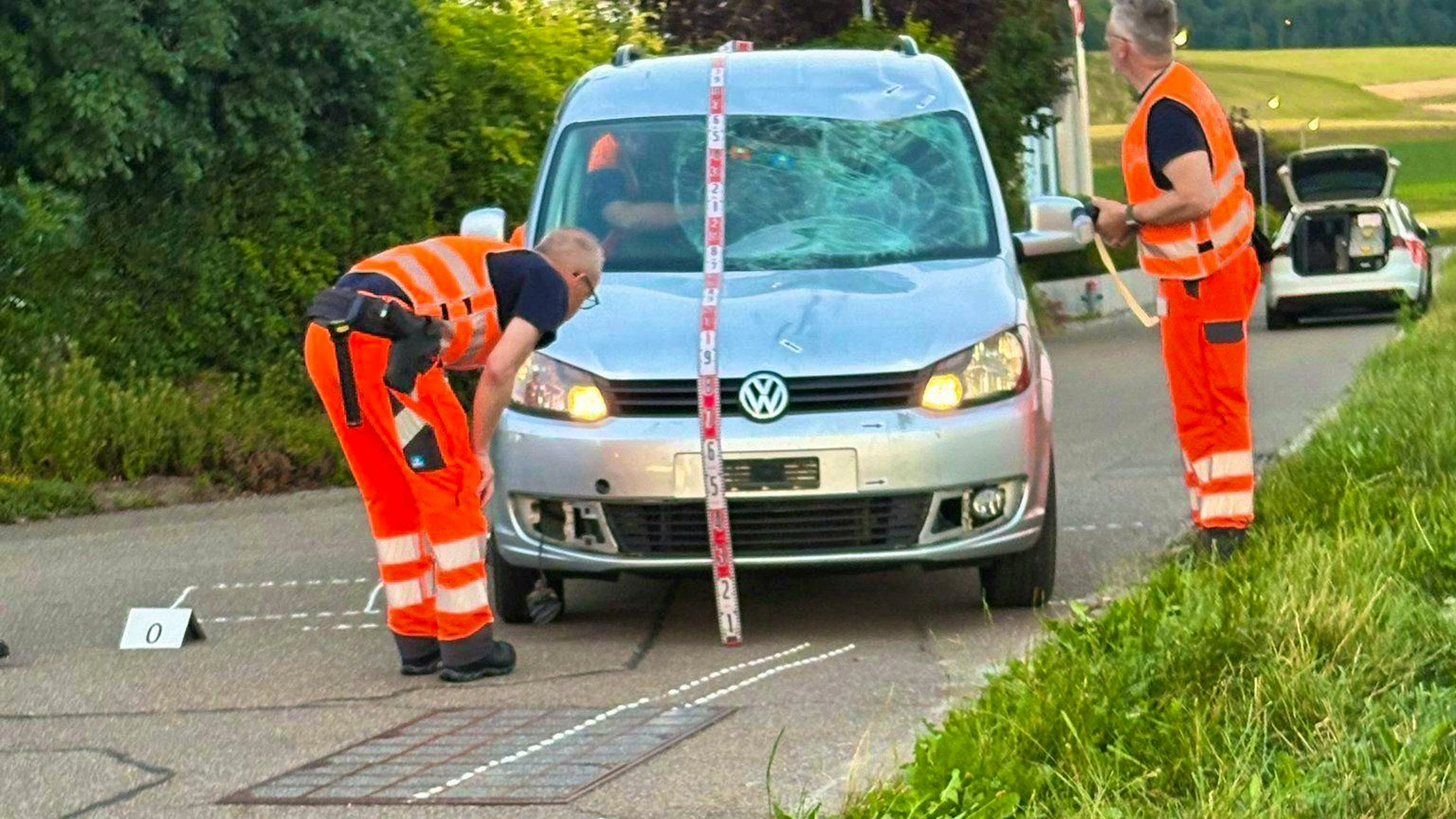 Police officers at the scene of the accident in Benken, ZH, on Wednesday evening.
