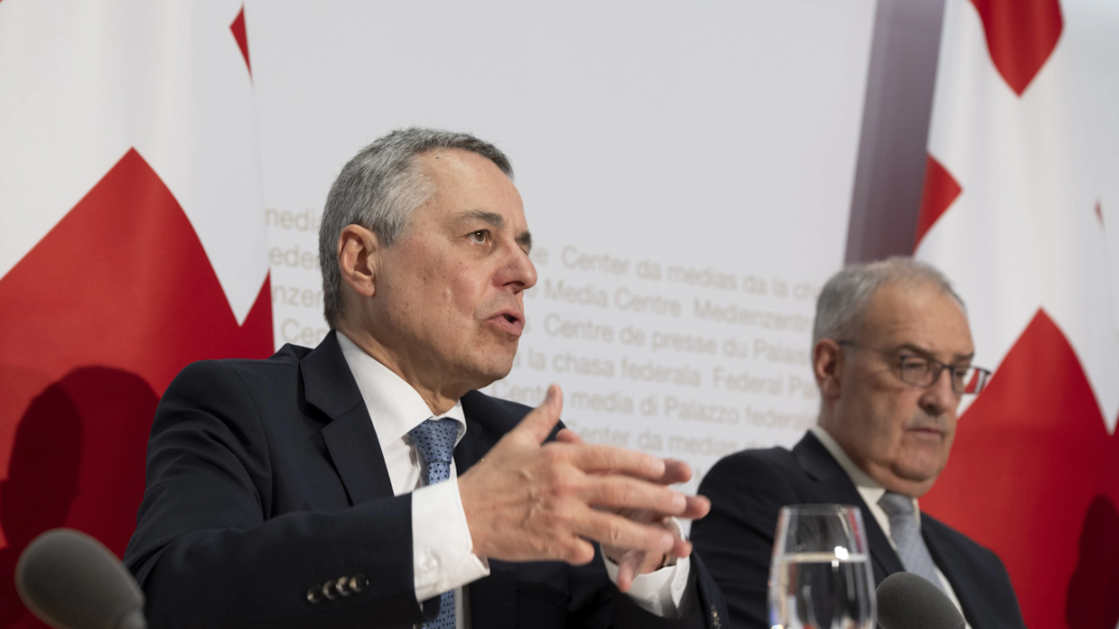 Federal Councilors Ignazio Cassis (left) and Guy Parmelin announced drastic cuts to development aid at the end of June—and major foundations are now up in arms over the decision.