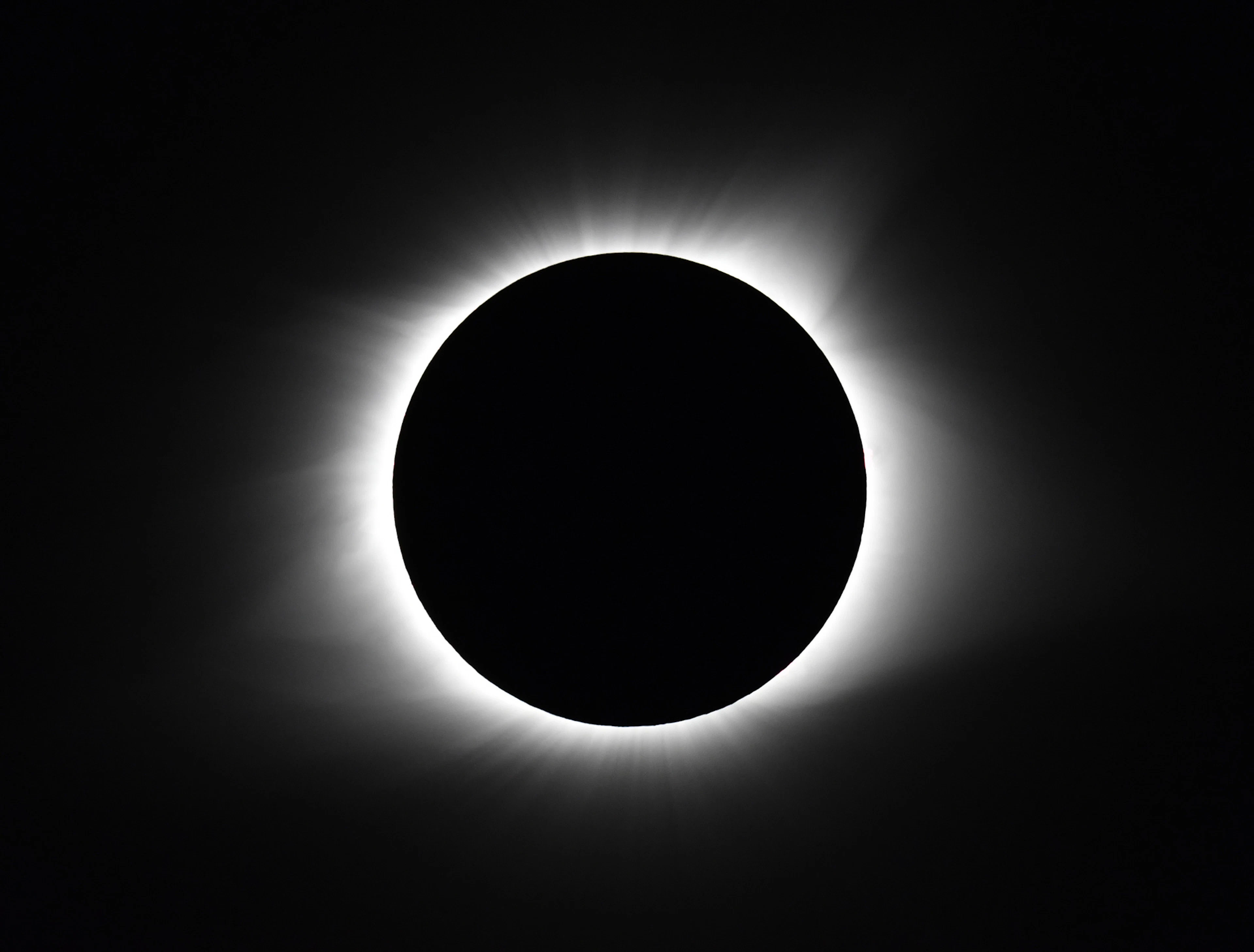 The solar corona is the Sun's outer, extremely hot atmosphere, which can usually only be seen during a total solar eclipse.