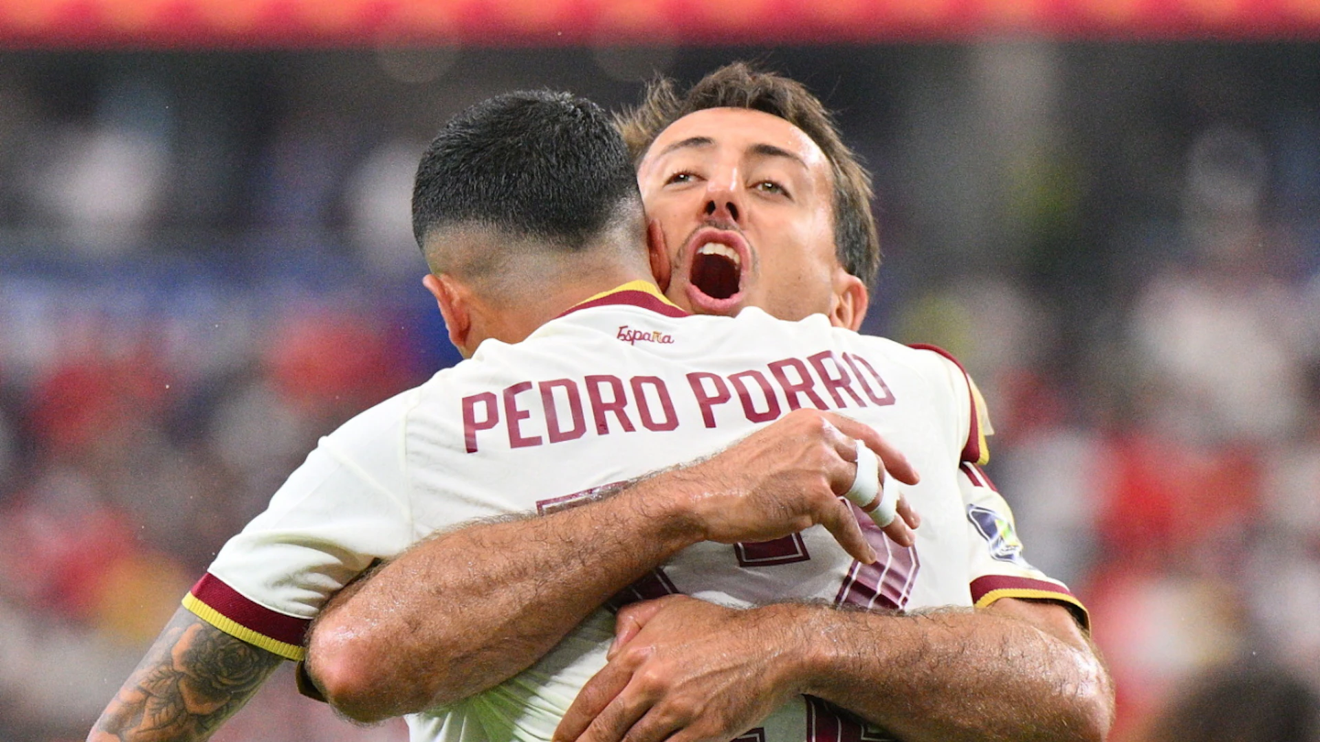 Spanish goal scorers Mikel Oyarzabal and Pedro Porro celebrate advancing to the World Cup final