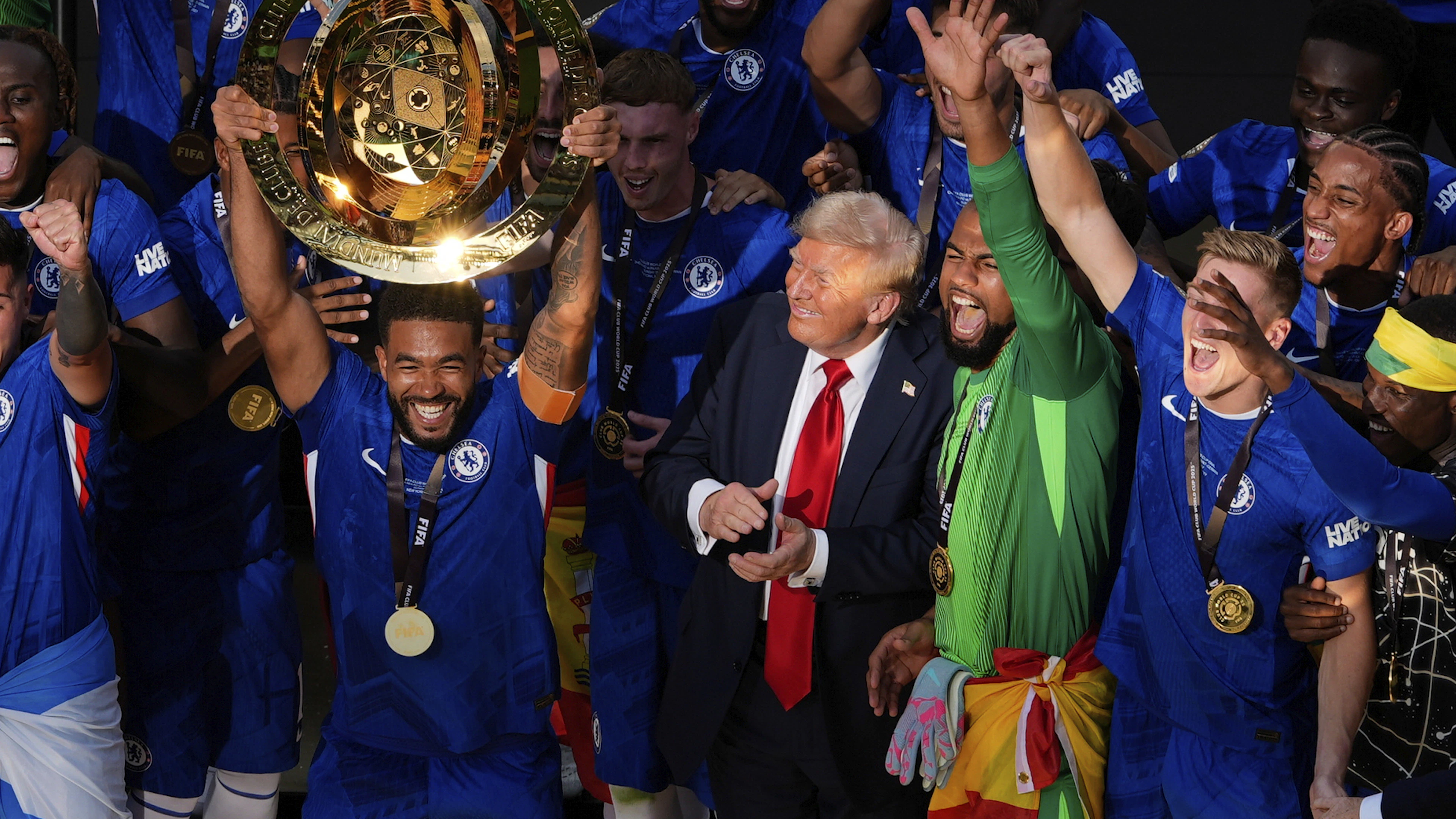 An unforgettable image: Donald Trump and the jubilant Chelsea players.