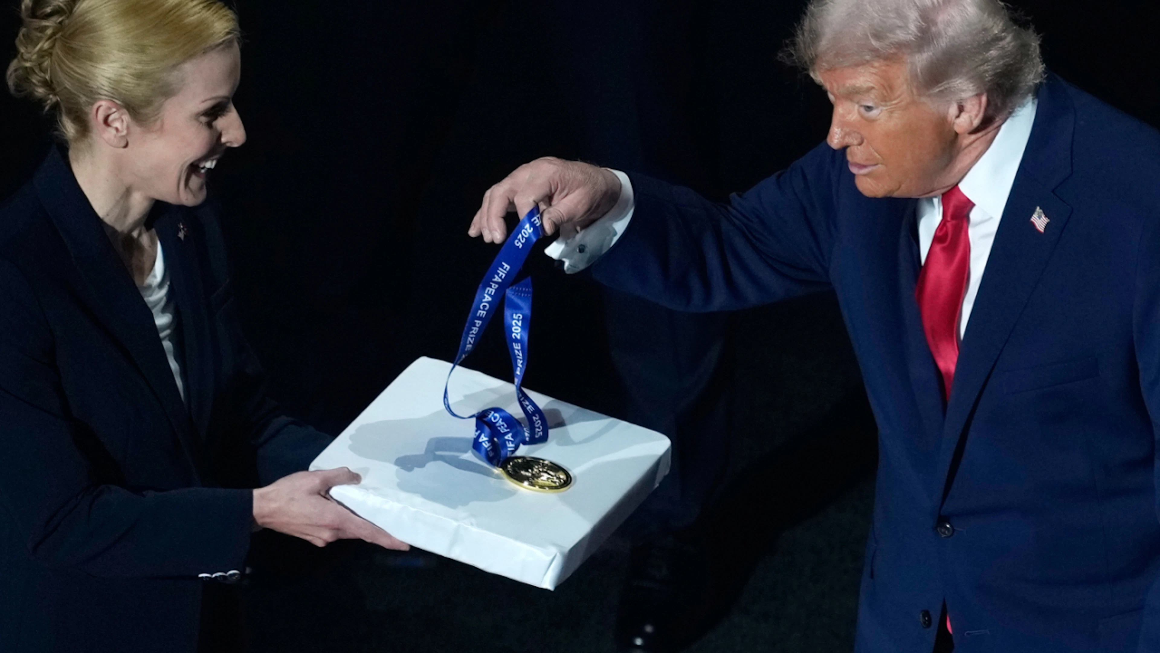 Donald Trump snags the FIFA Peace Prize at the group draw—but when it comes to the World Cup trophy, the U.S. president has to settle for a replica